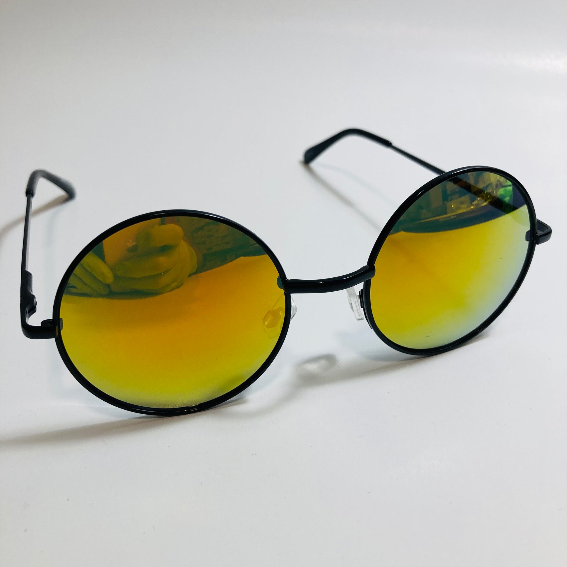 mens and womens yellow and black mirrored round sunglasses