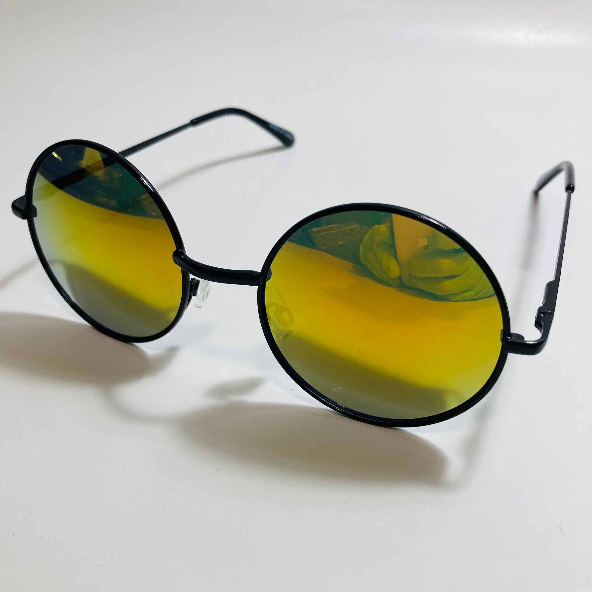 mens and womens yellow and black mirrored round sunglasses