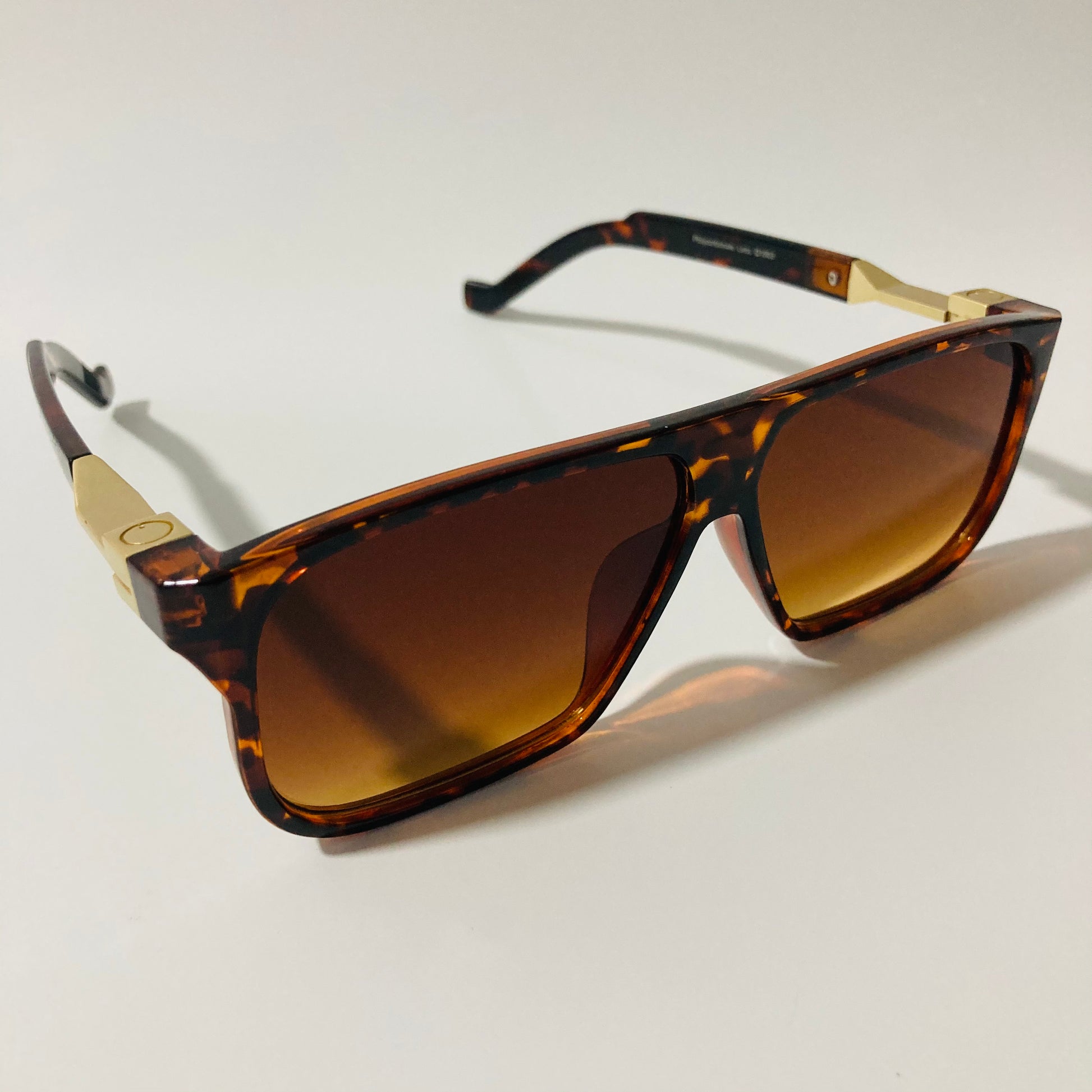 mens and womens brown and gold square sunglasses