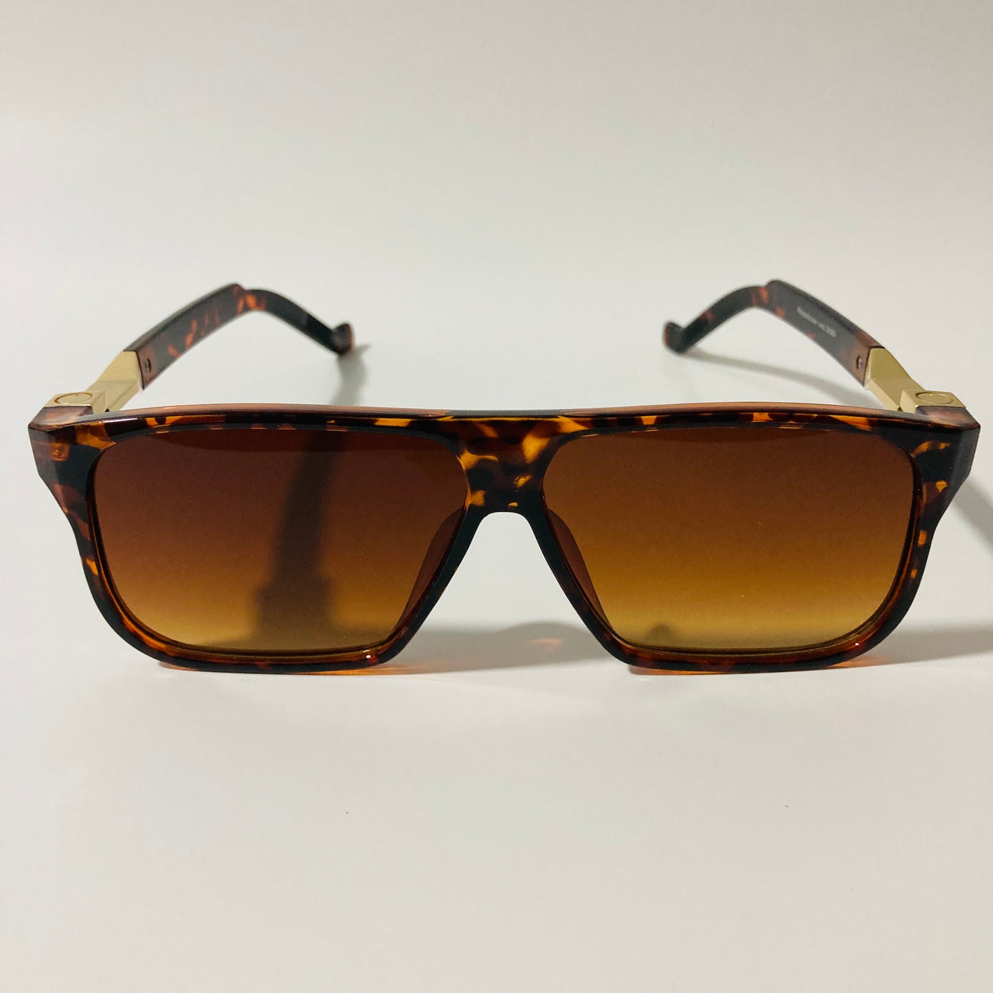 mens and womens brown and gold square sunglasses