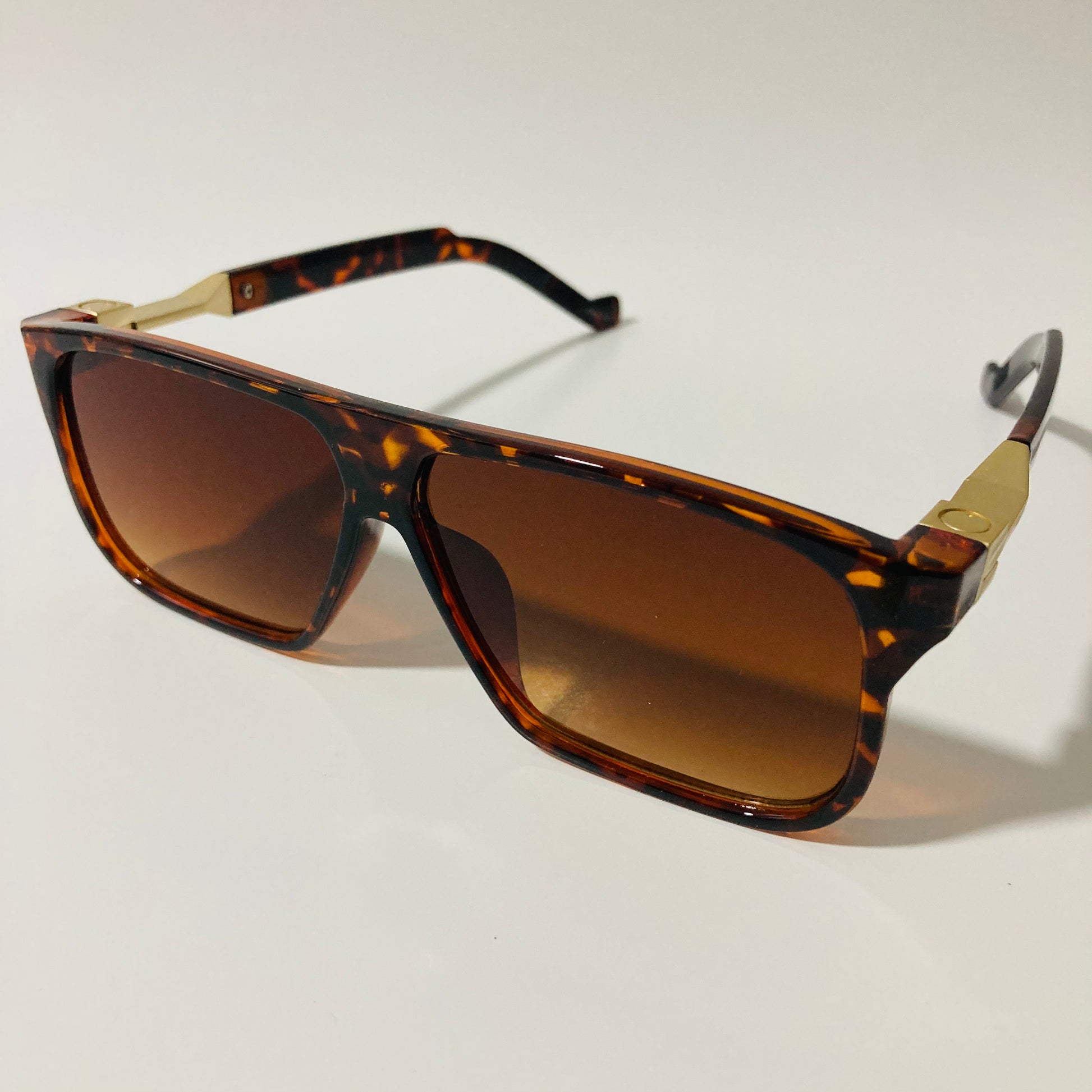 mens and womens brown and gold square sunglasses