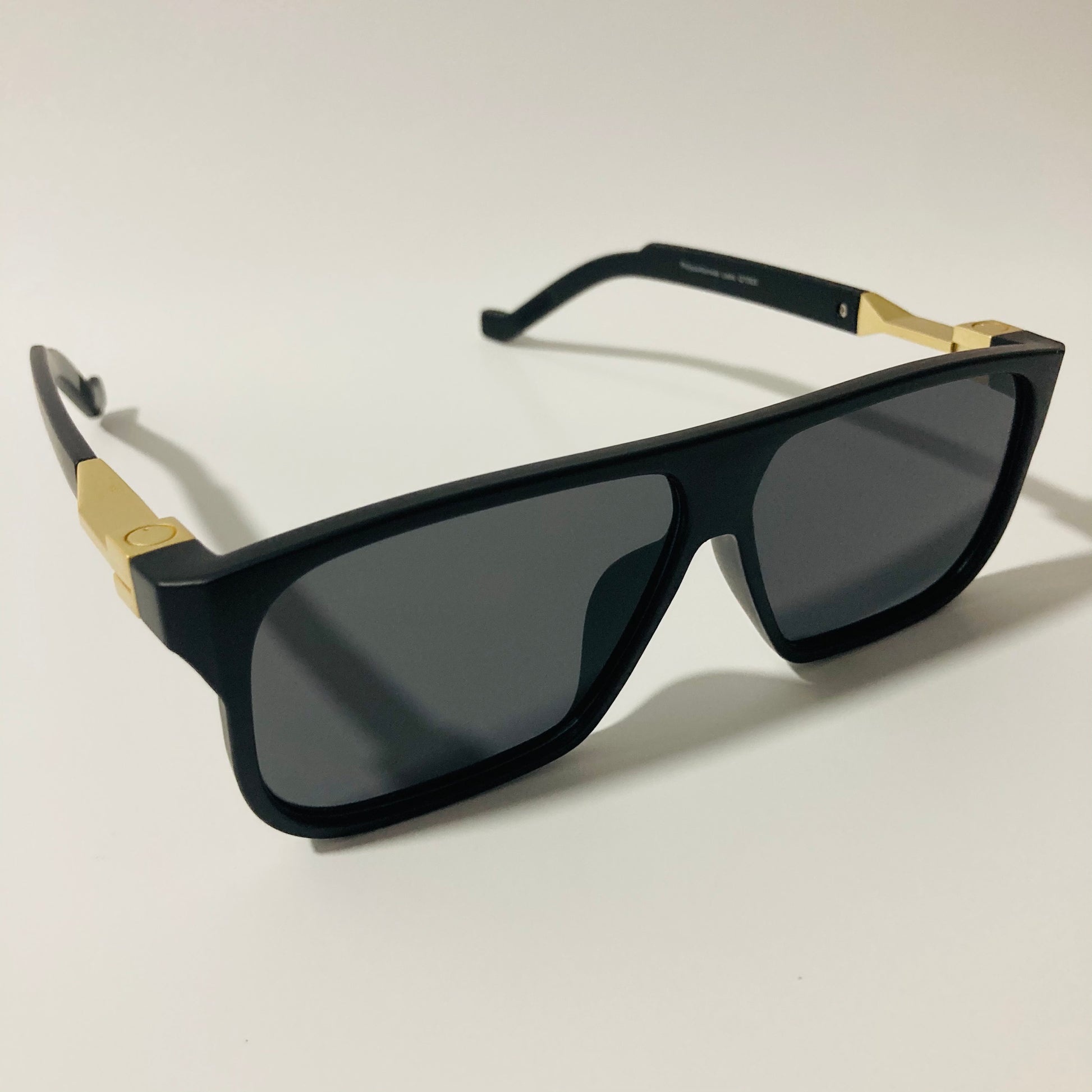 mens and womens black and gold square sunglasses