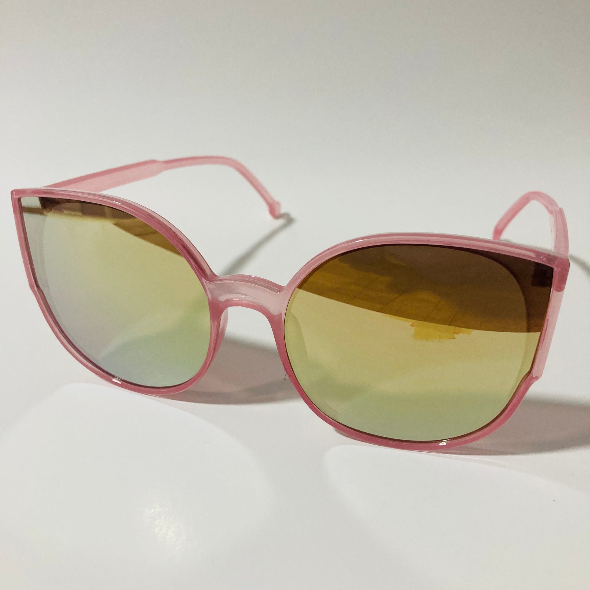 womans pink and green mirrored cat eye sunglasses