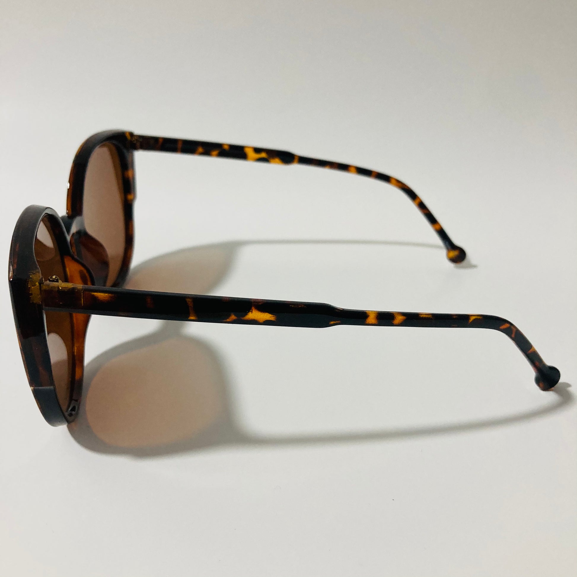 womans brown mirrored cat eye sunglasses