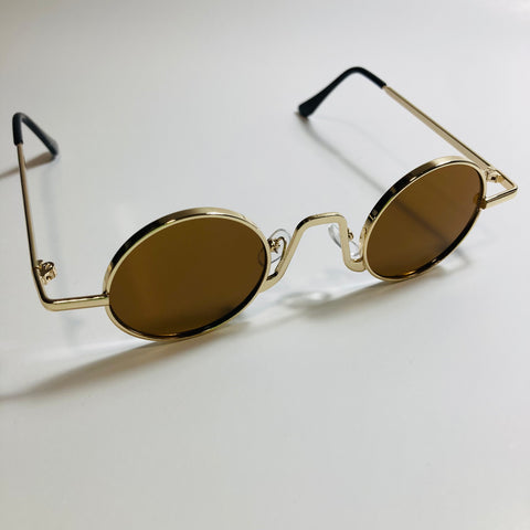 womens and mens gold and brown ozzy osbourne sunglasses