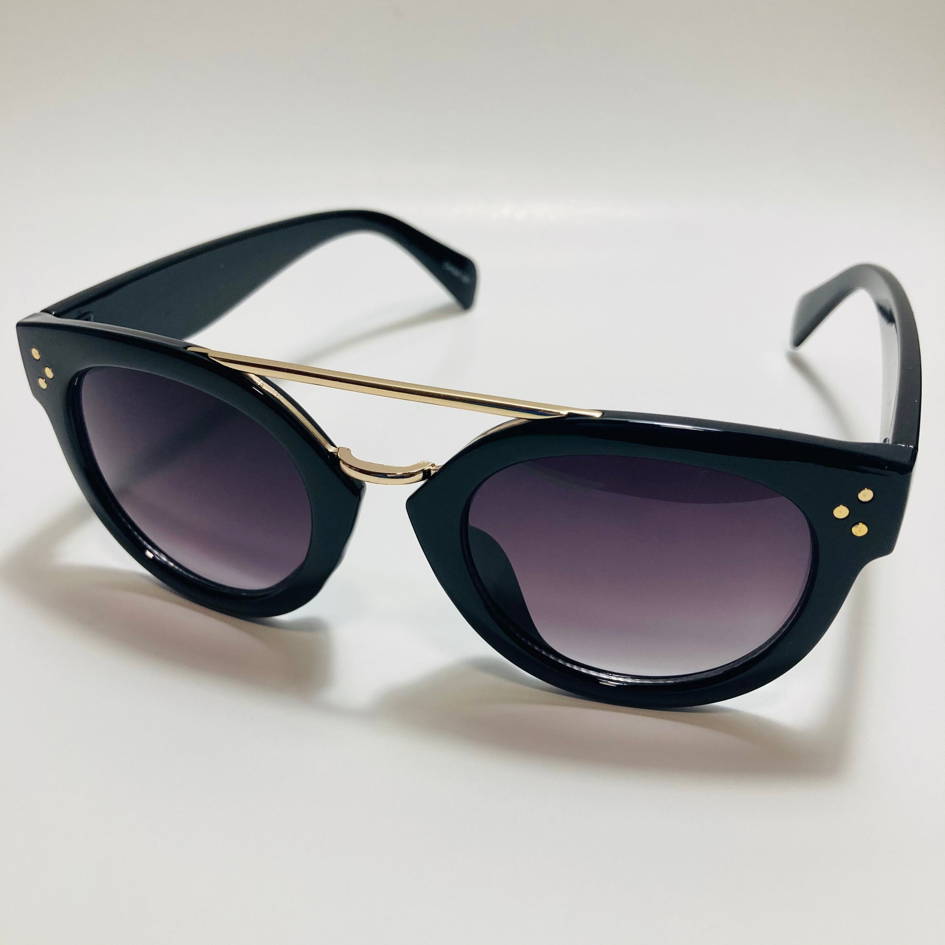womens black and gold round sunglasses