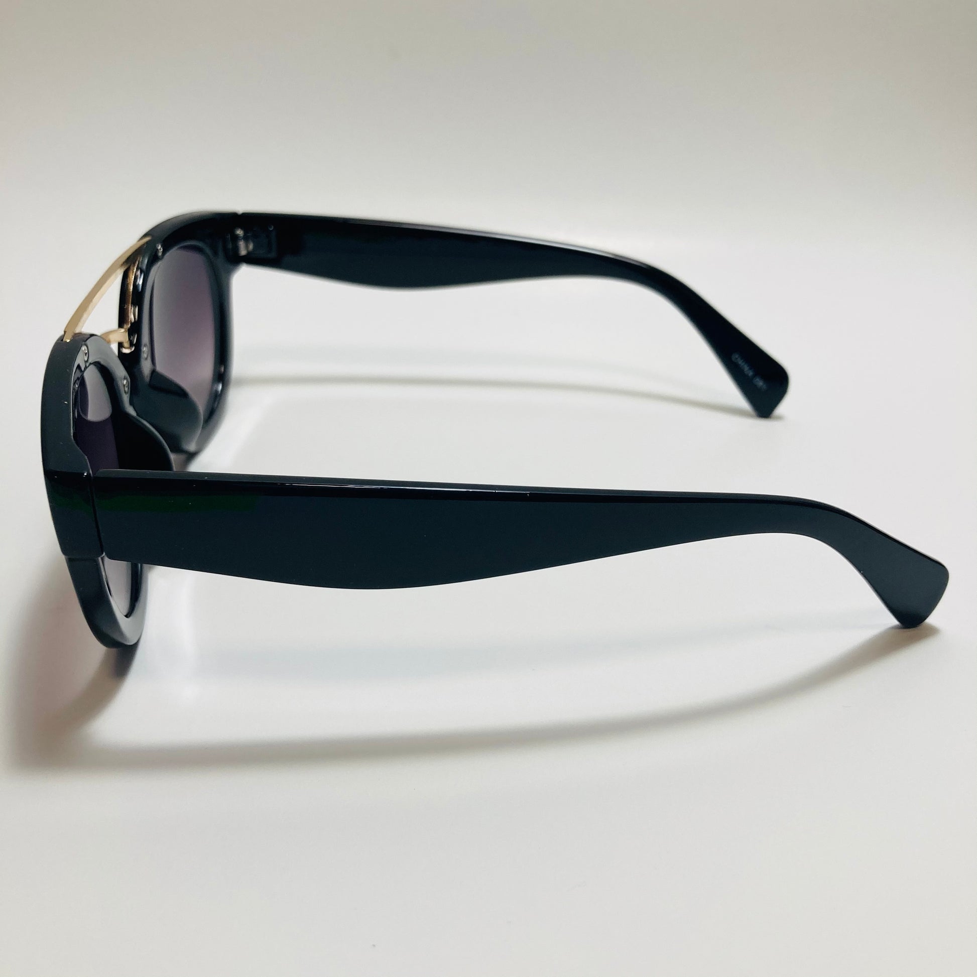 womens black and gold round sunglasses