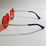 womens gold and red heart shape sunglasses