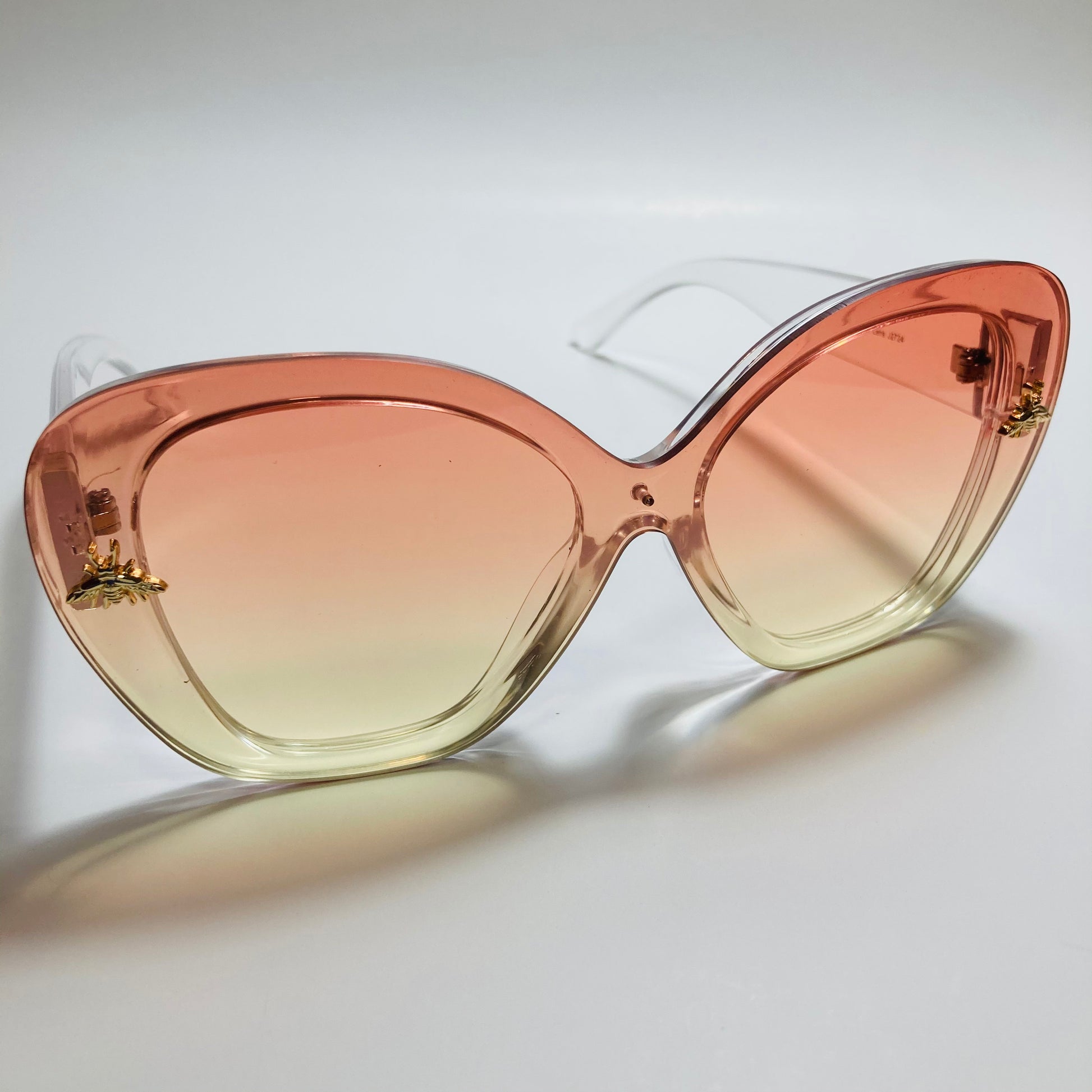 womens pink and yellow oversize cat eye sunglasses