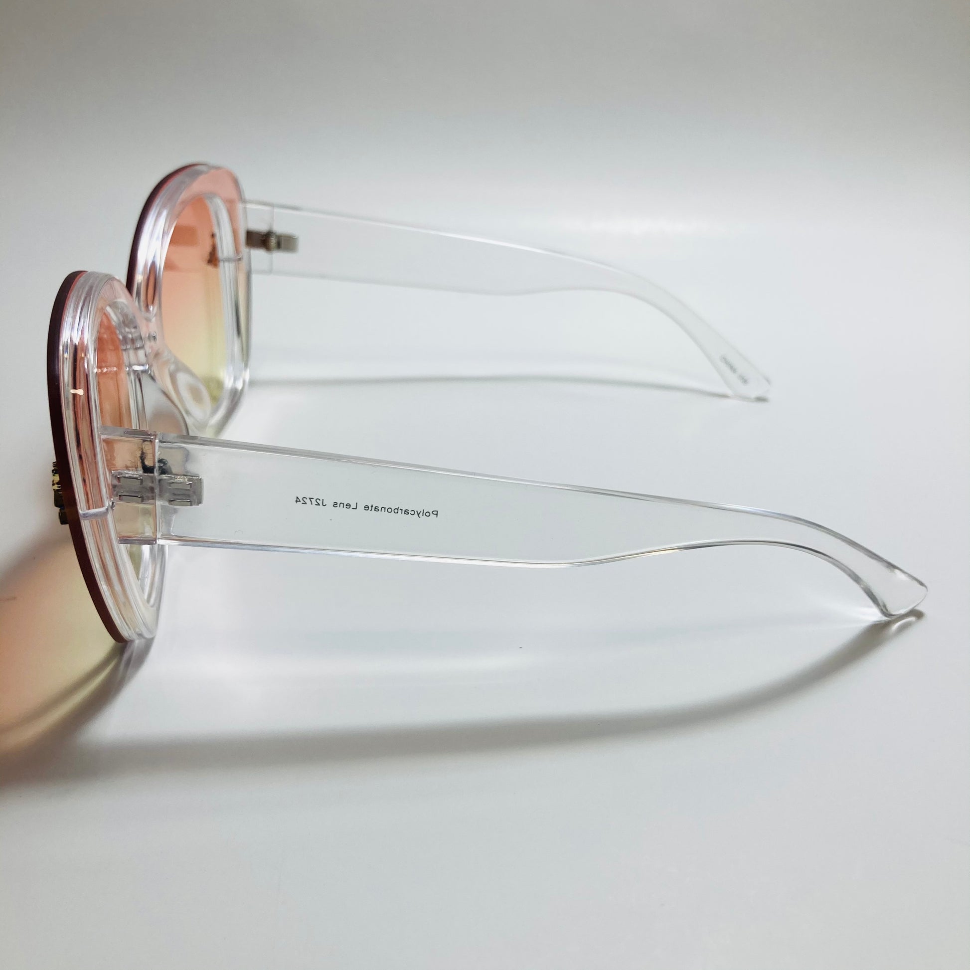 womens pink and yellow oversize cat eye sunglasses