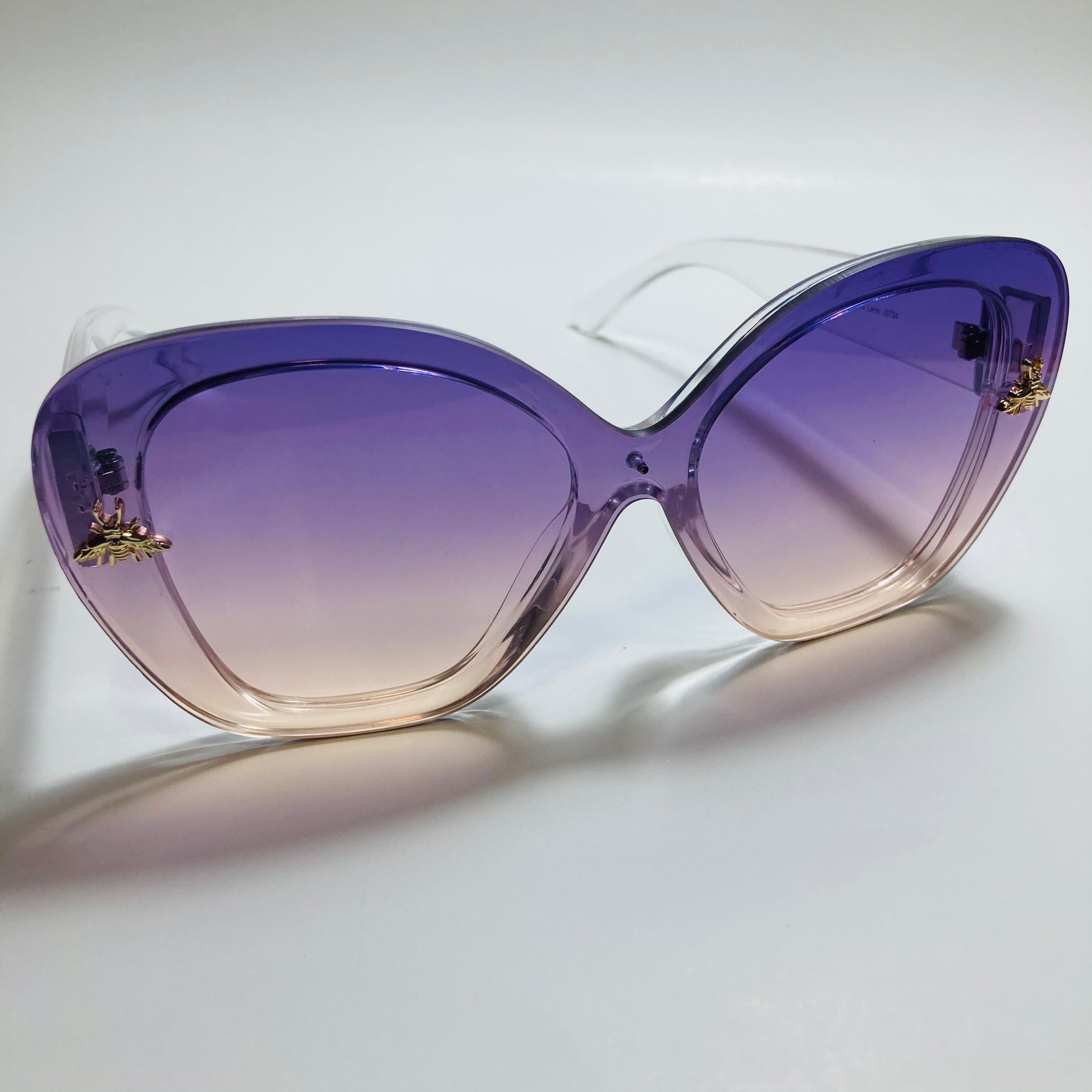 womens purple and yellow oversize cat eye sunglasses