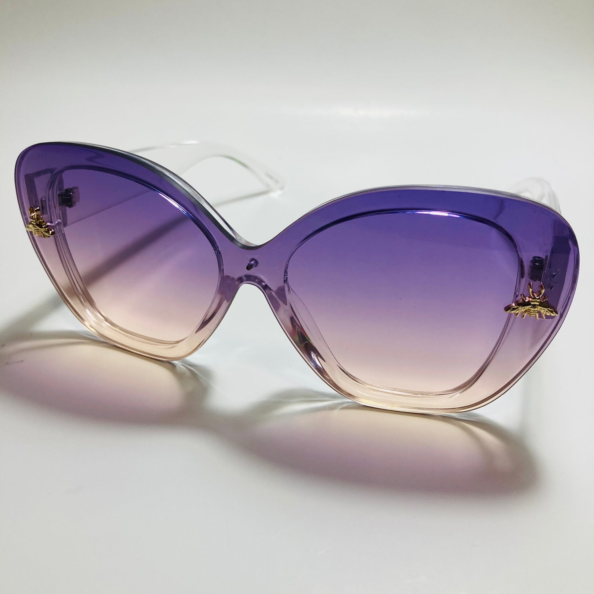womens purple and yellow oversize cat eye sunglasses