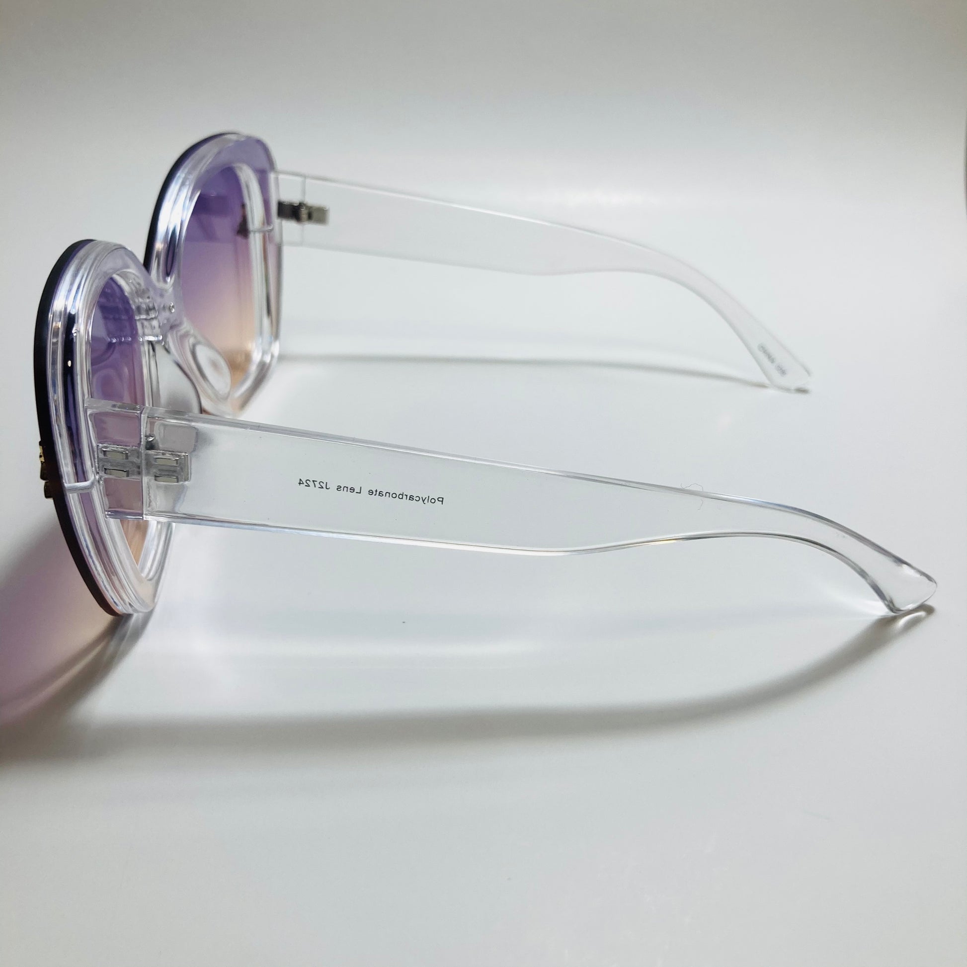 womens purple and yellow oversize cat eye sunglasses