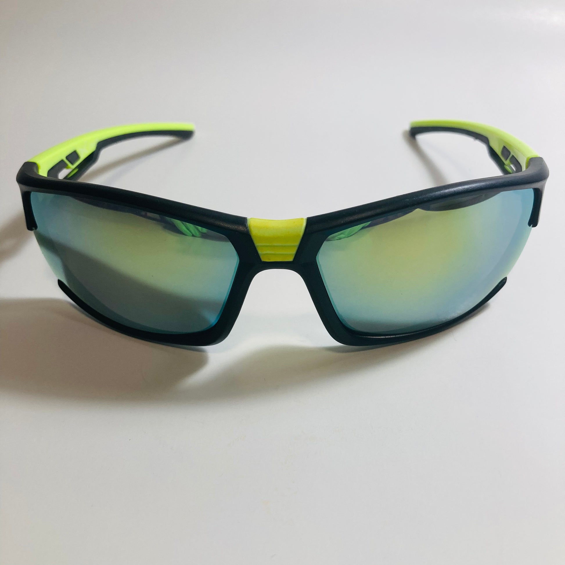 black, green, and yellow wrap around sunglasses