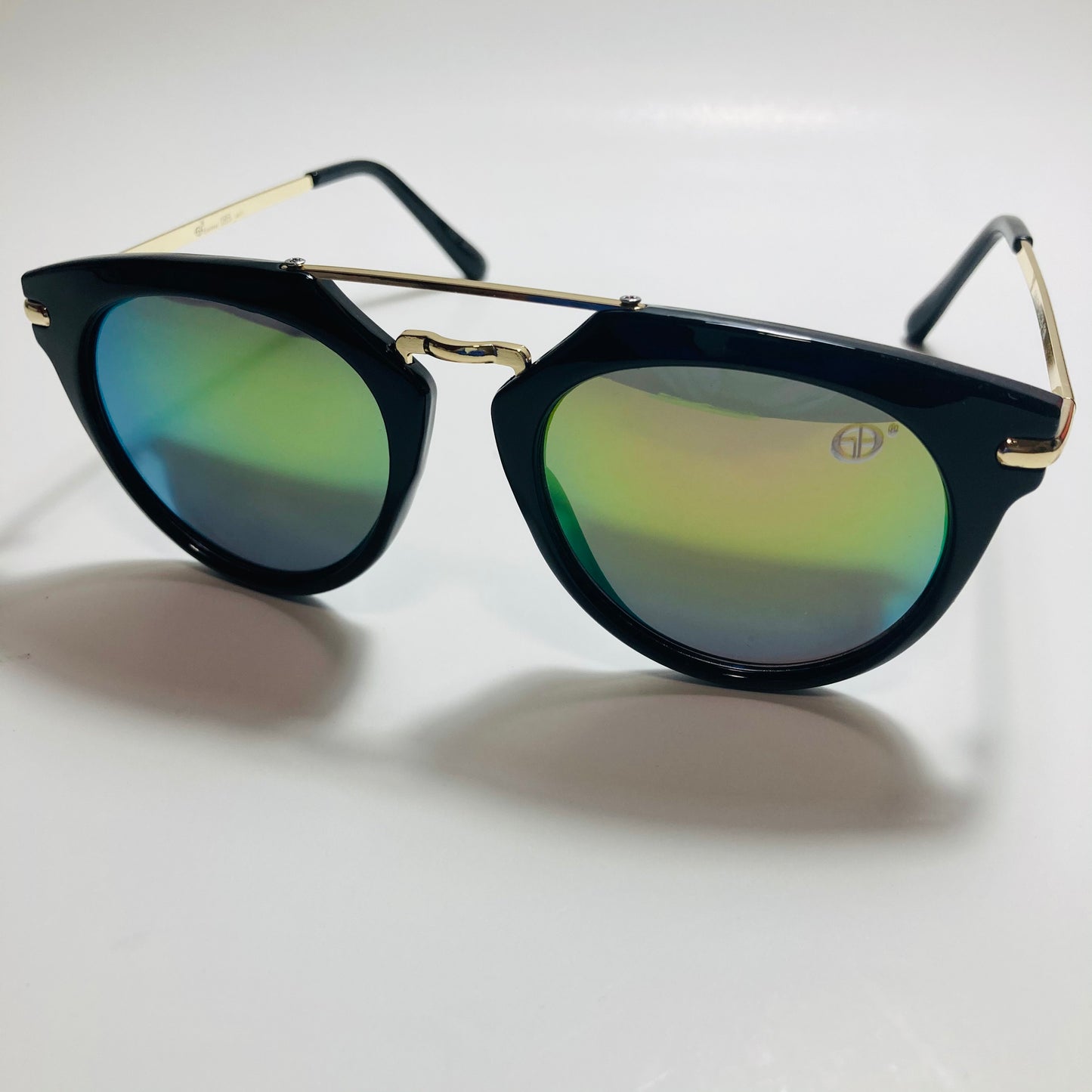 mens and womens black gold and green mirrored round sunglasses with crossbar