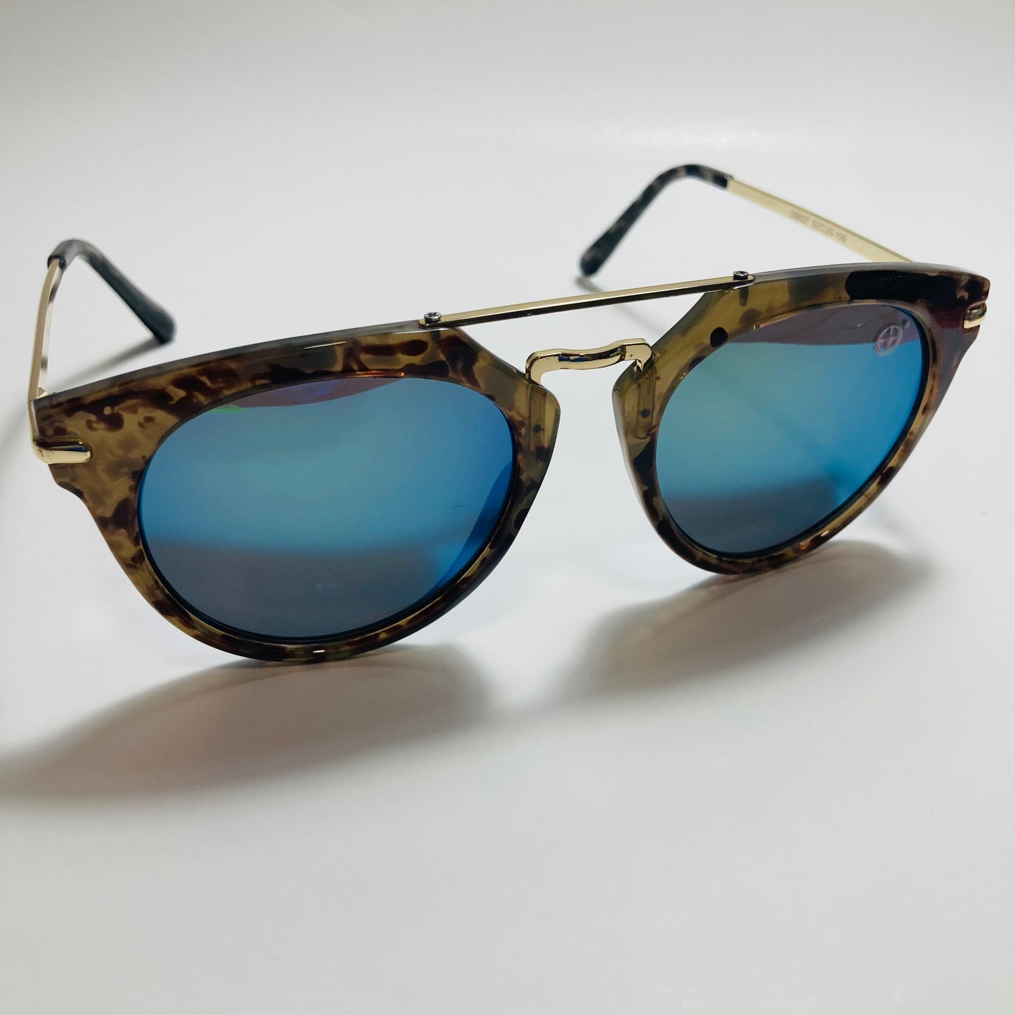 mens and womens green blue and gold mirrored round sunglasses with crossbar
