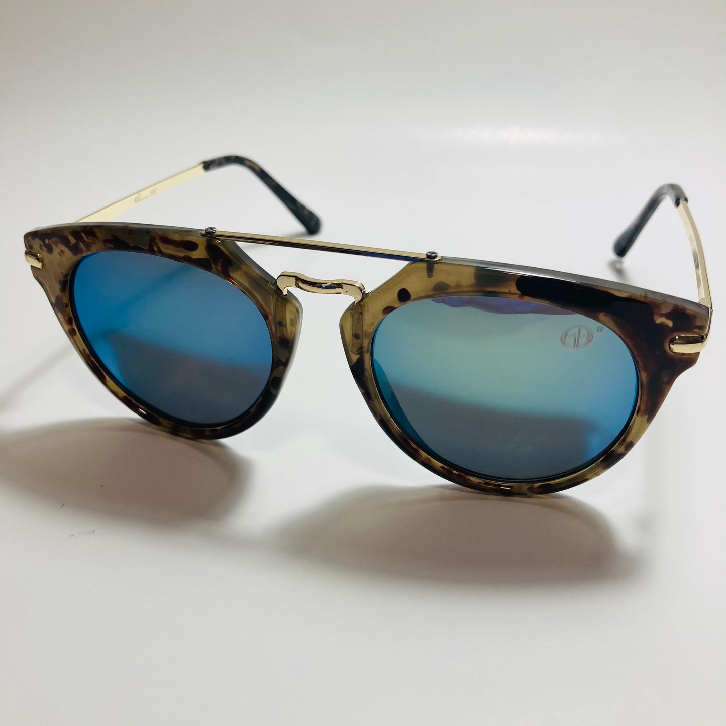 mens and womens green blue and gold mirrored round sunglasses with crossbar