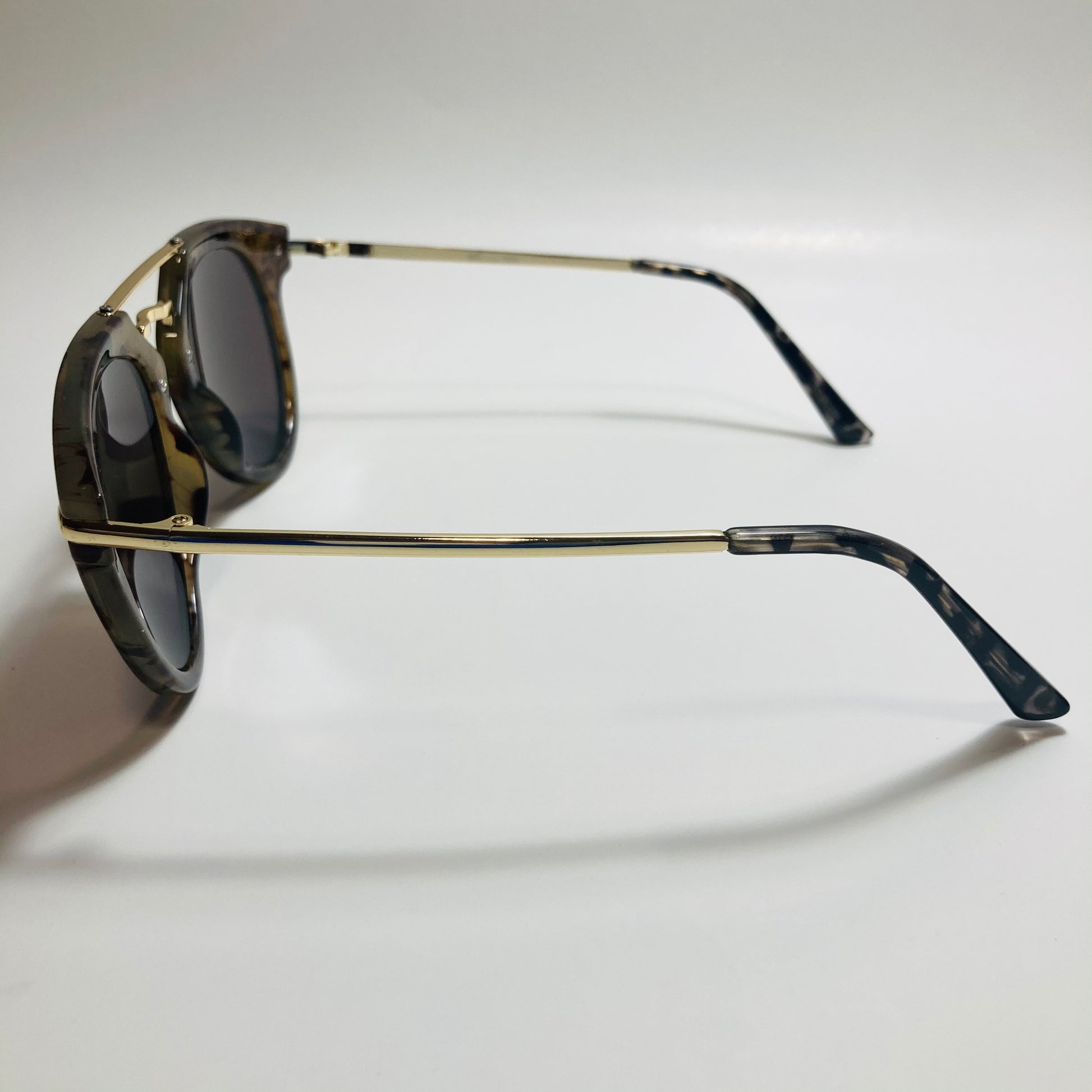 mens and womens green blue and gold mirrored round sunglasses with crossbar