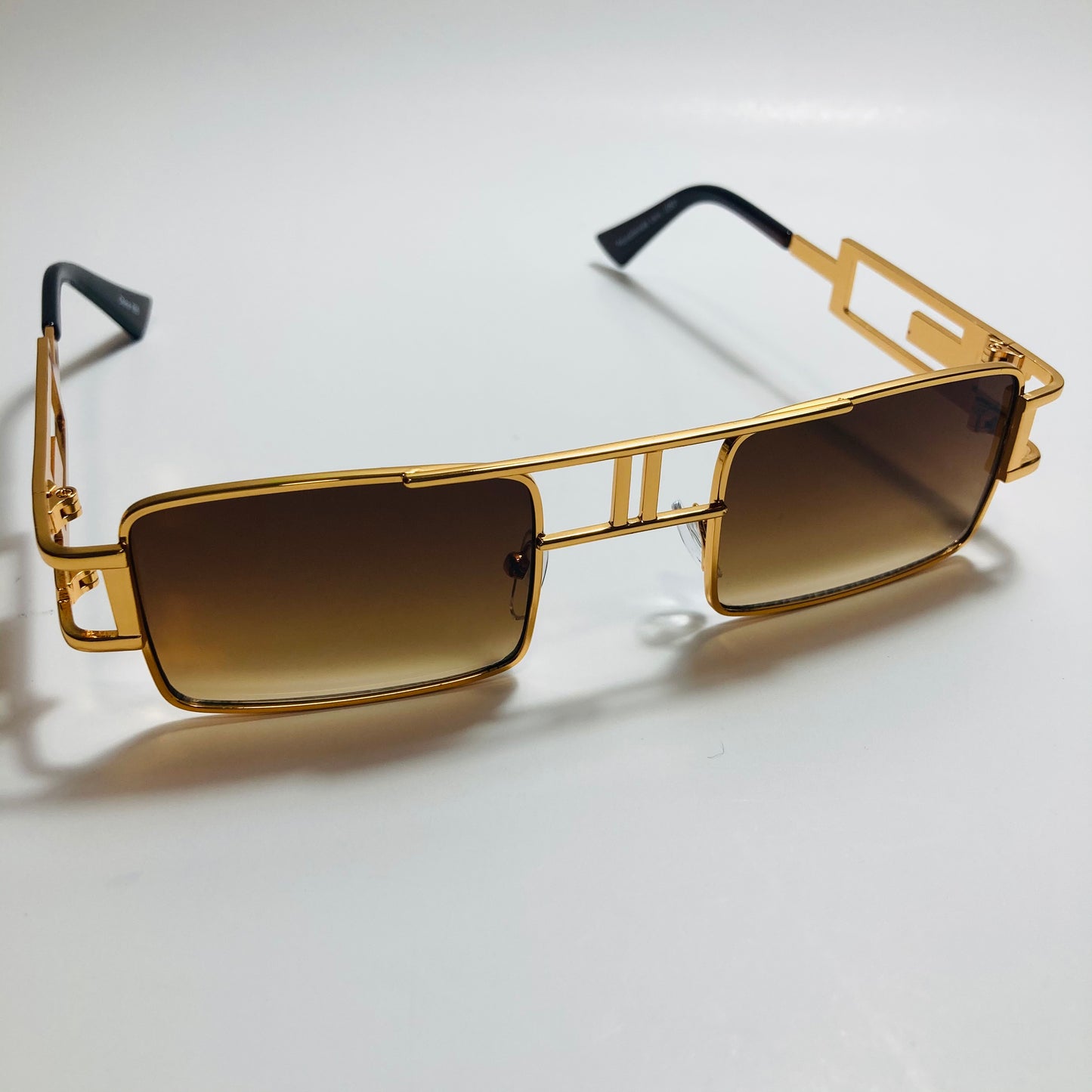 mens and womens brown and gold square sunglasses