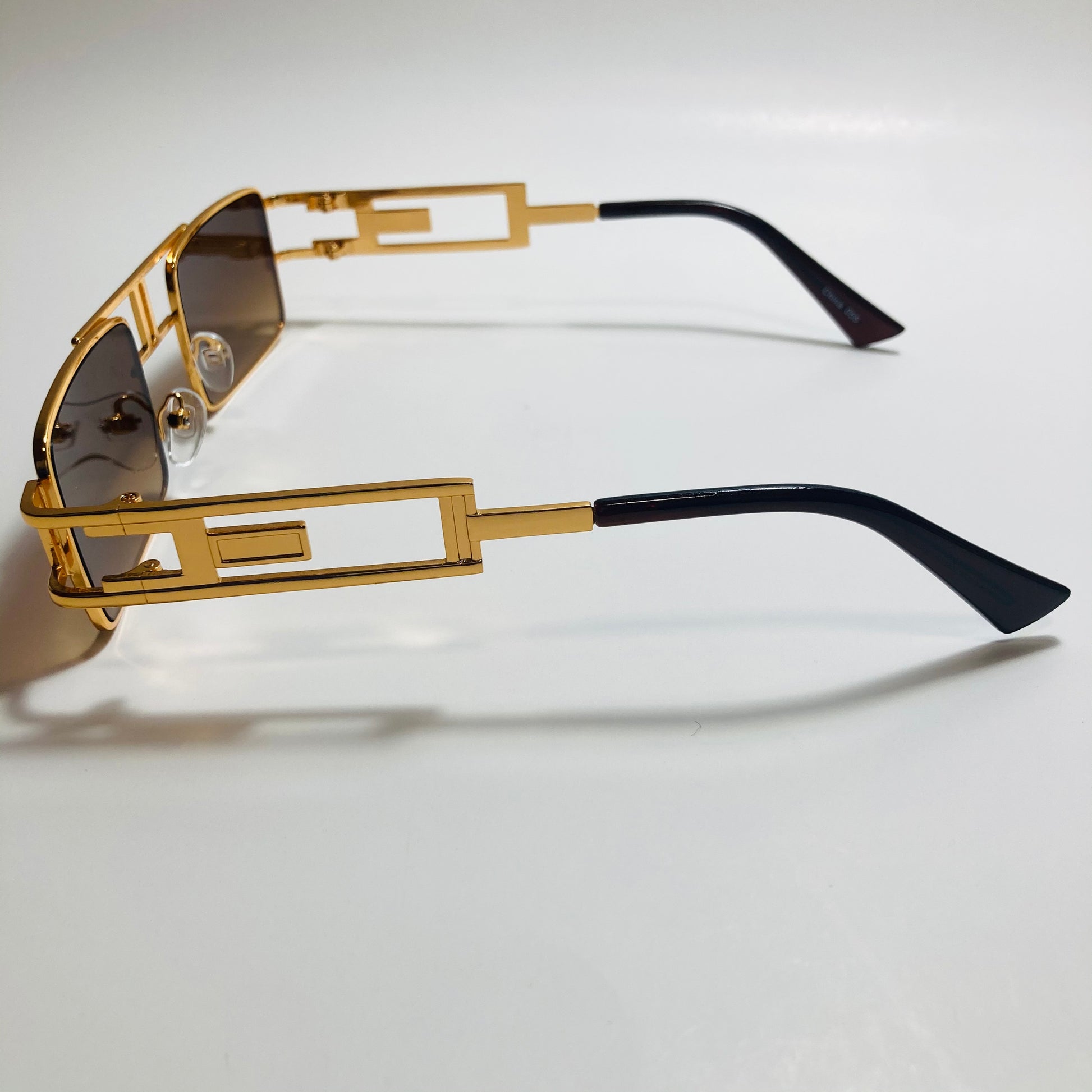 mens and womens brown and gold square sunglasses