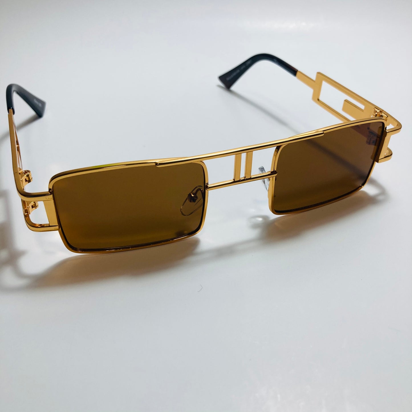 mens and womens brown and gold square sunglasses