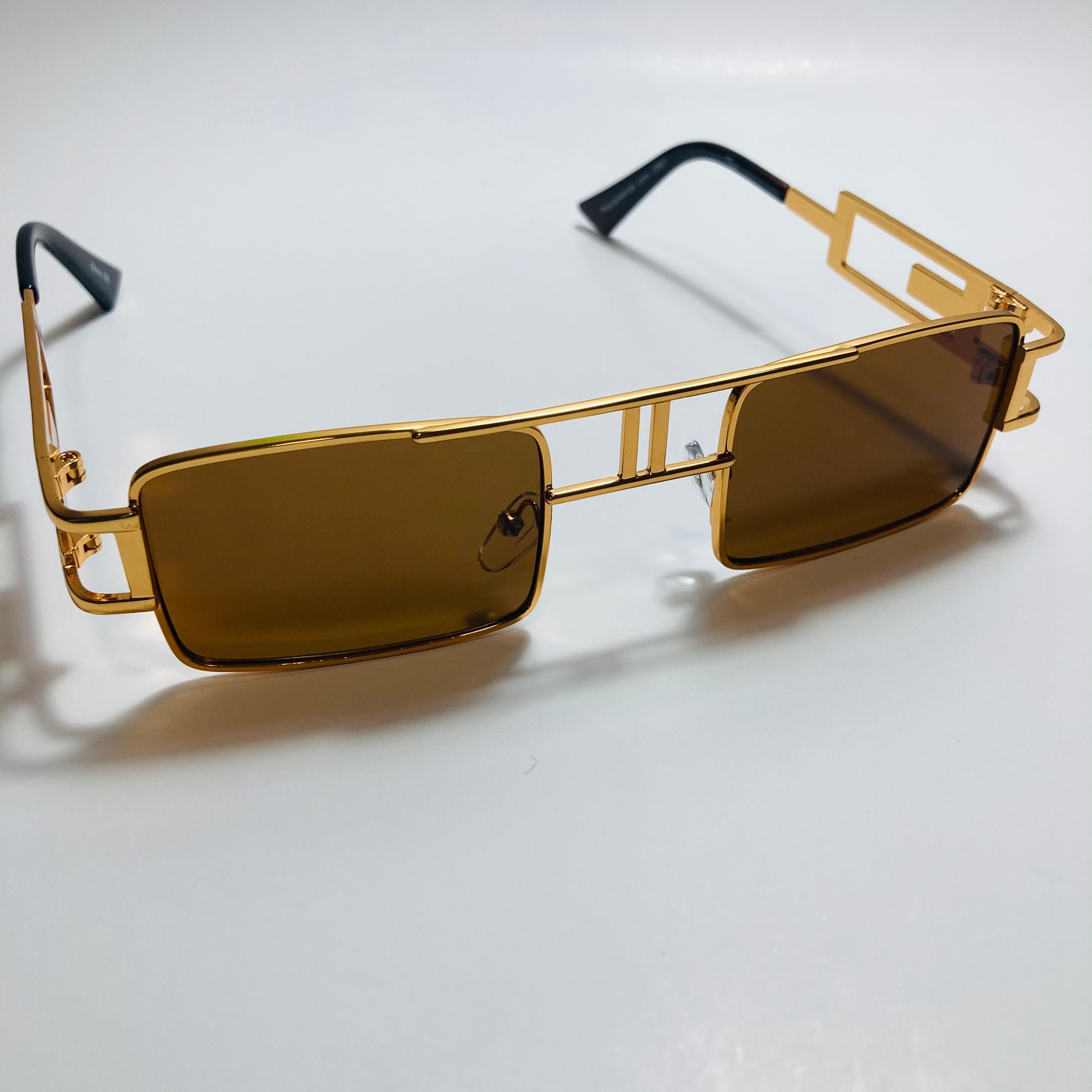 mens and womens brown and gold square sunglasses