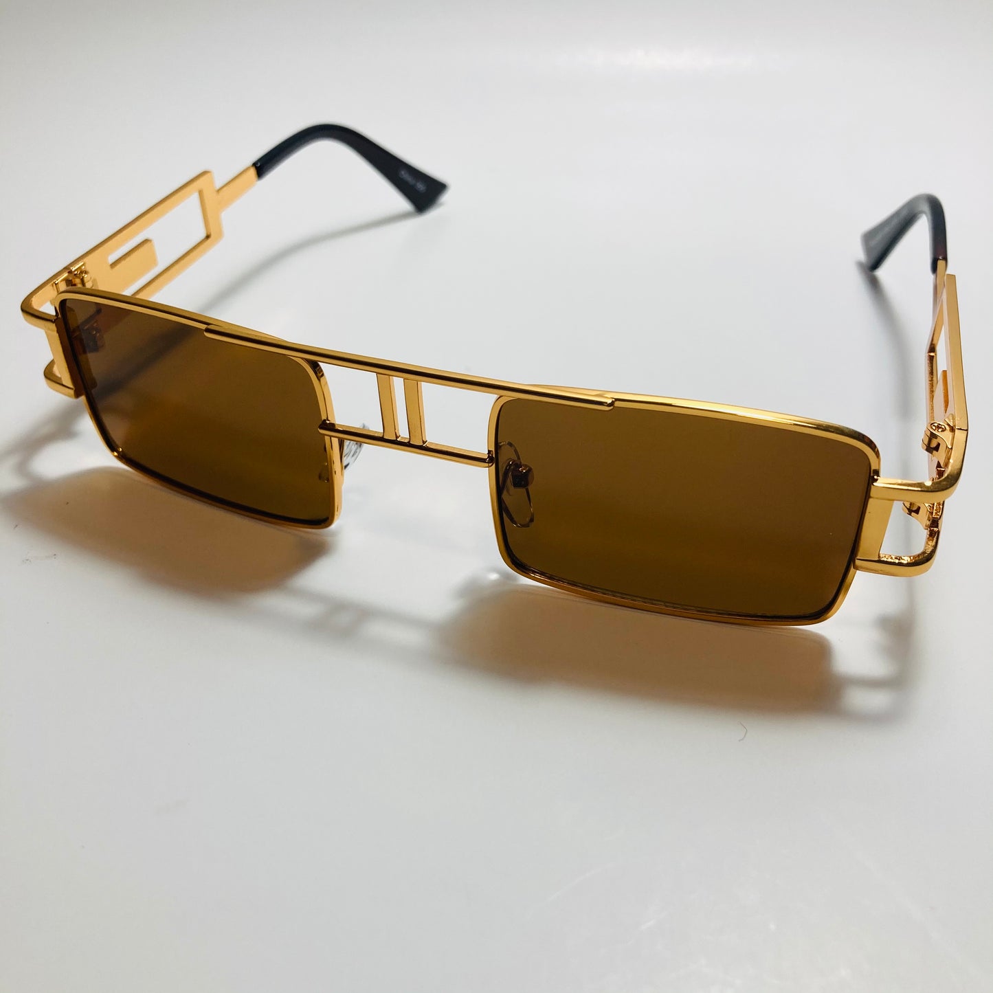 mens and womens brown and gold square sunglasses
