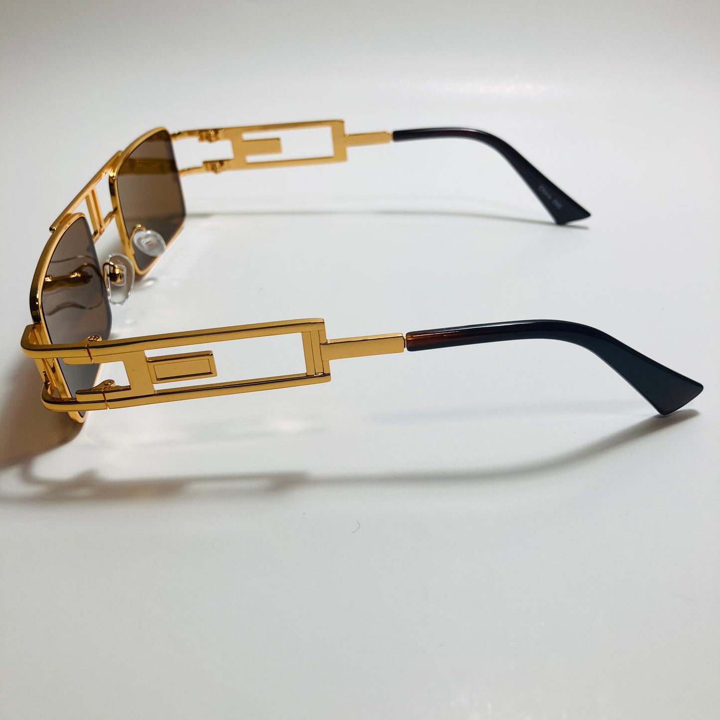 mens and womens brown and gold square sunglasses