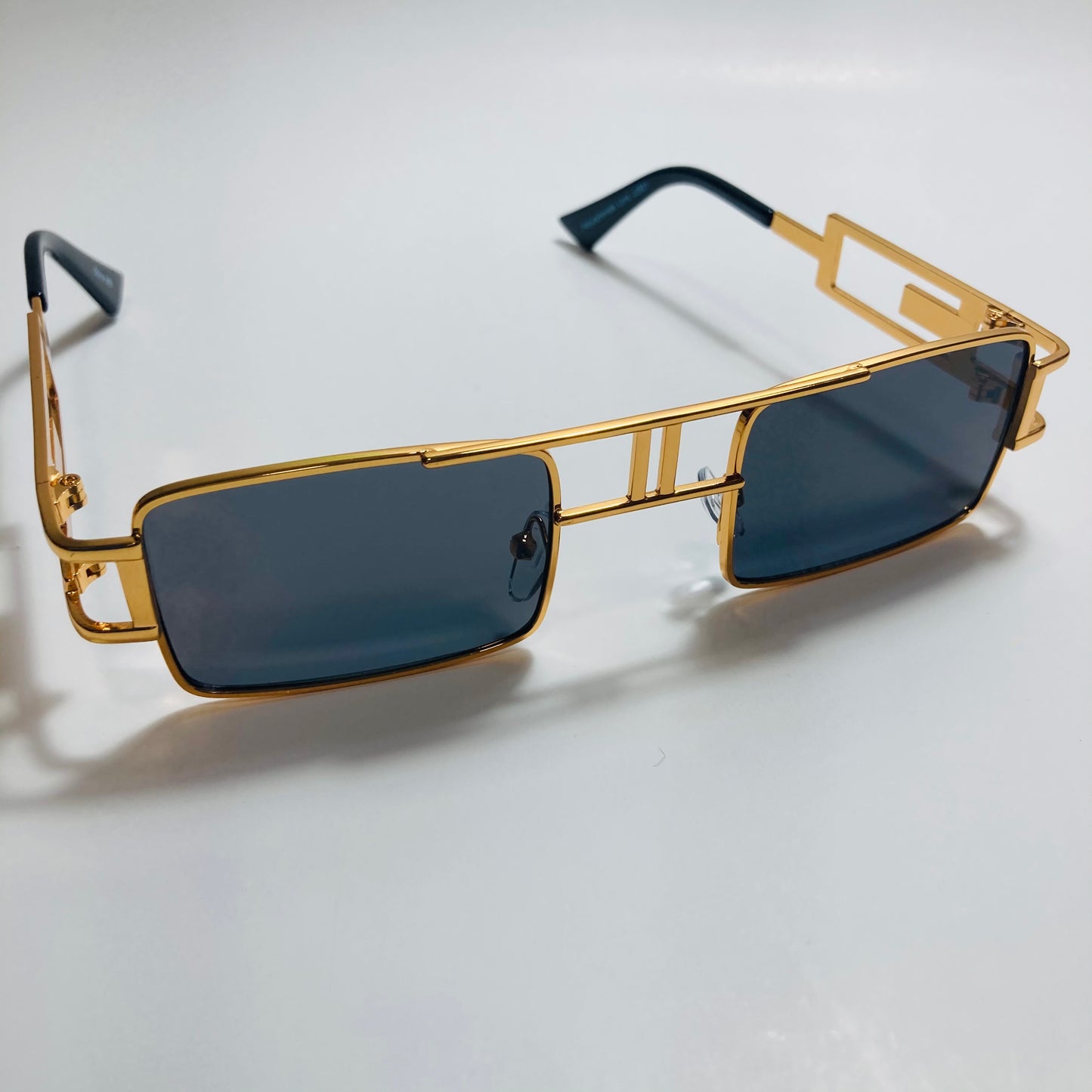 mens and womens black and gold square sunglasses