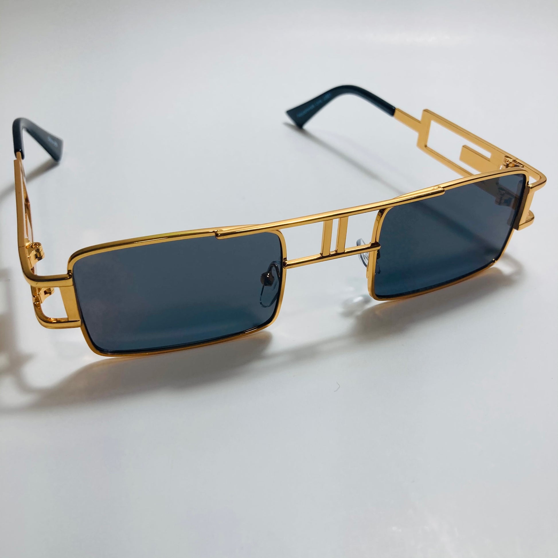 mens and womens black and gold square sunglasses