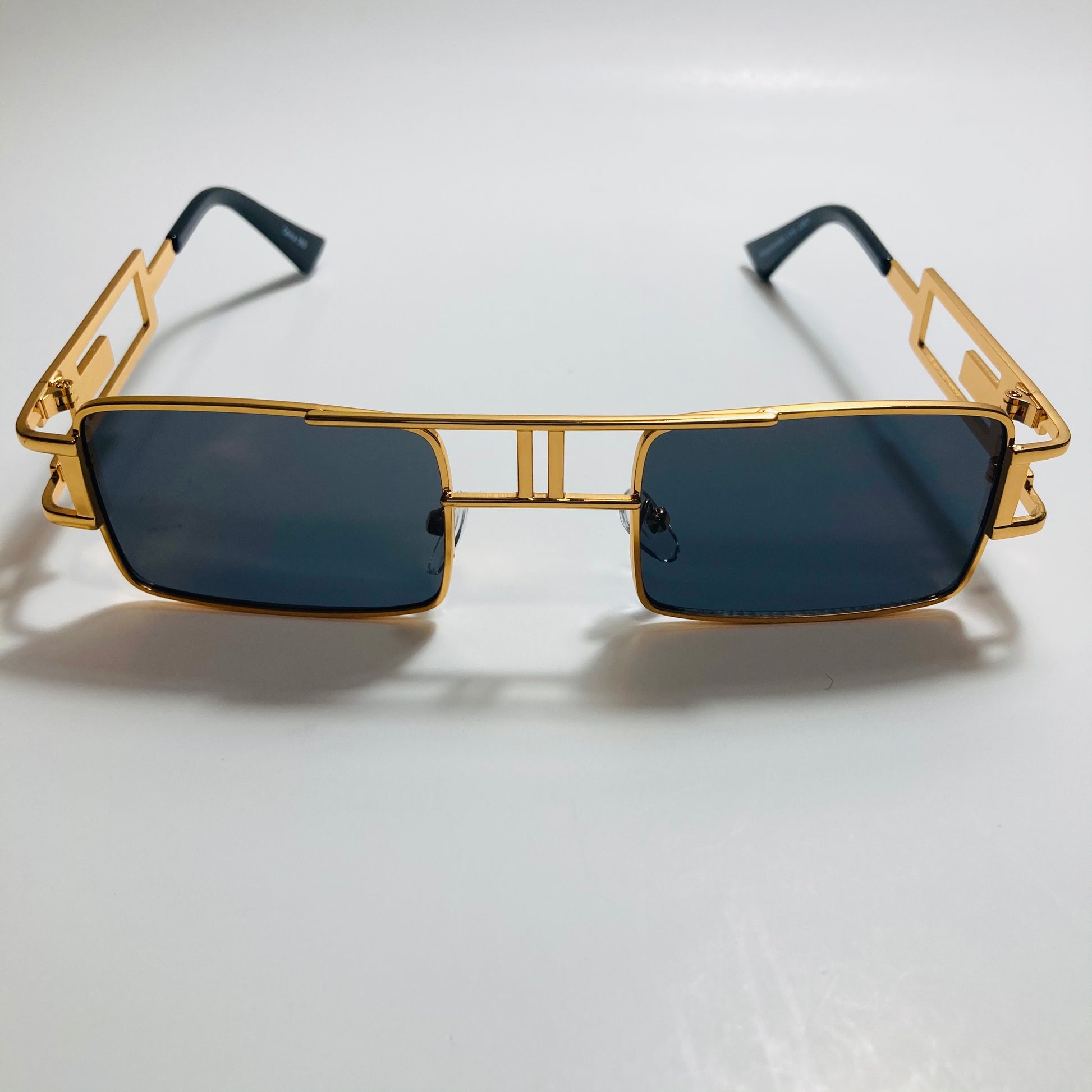 mens and womens black and gold square sunglasses