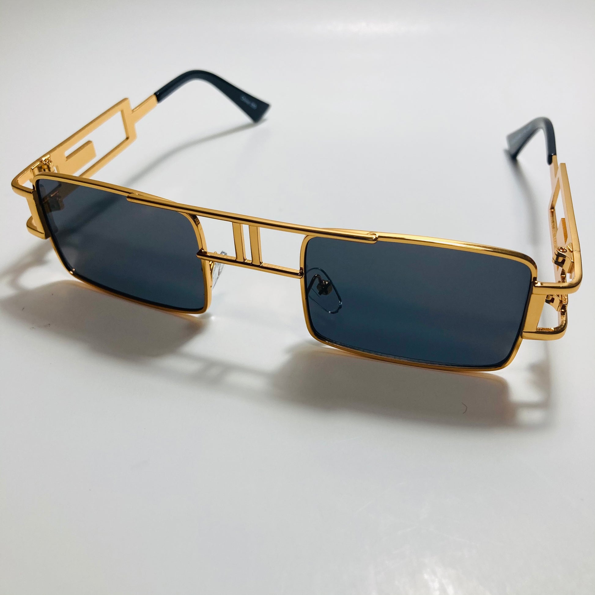 mens and womens black and gold square sunglasses