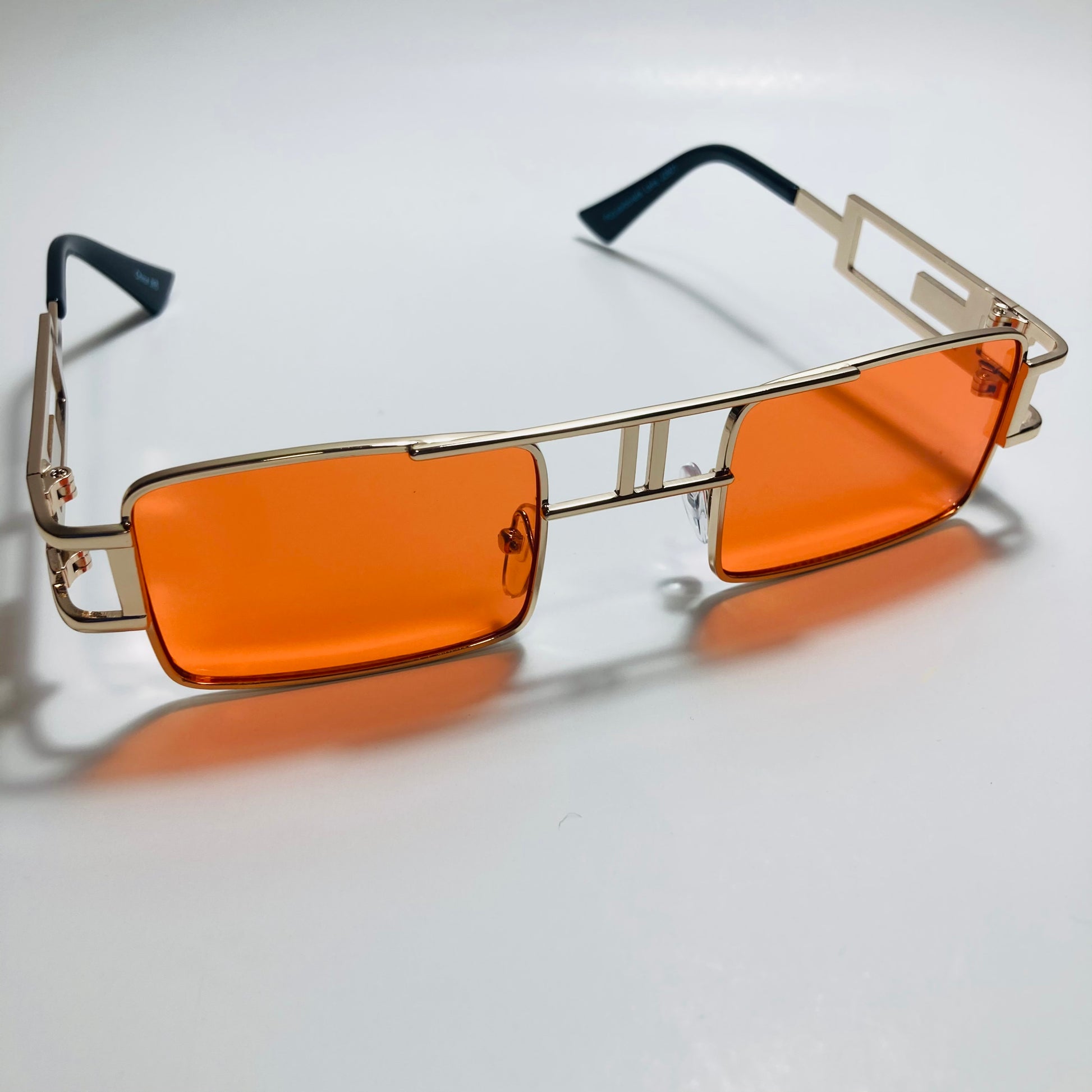 mens and womens red and gold square sunglasses