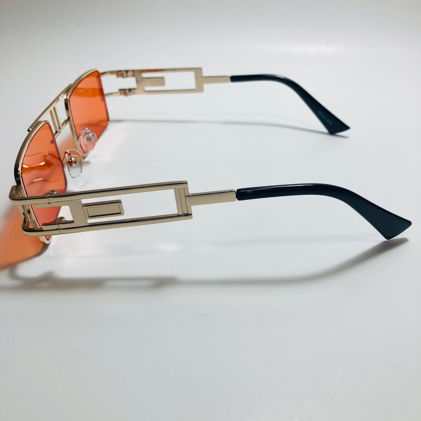mens and womens red and gold square sunglasses