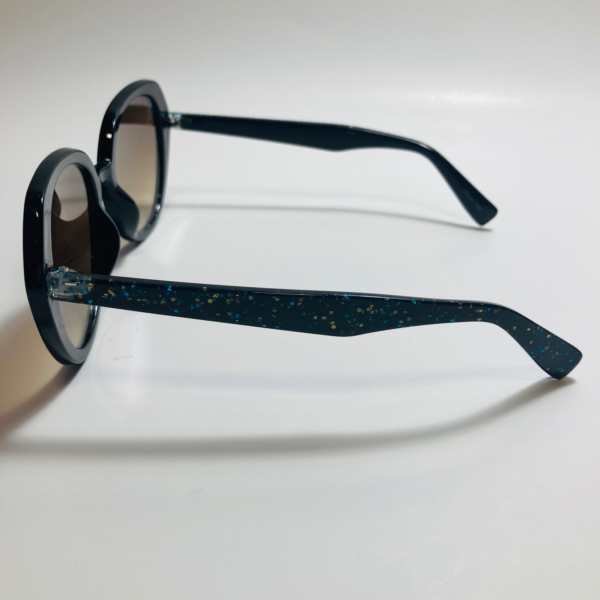 womens black and brown round glitter sunglasses 