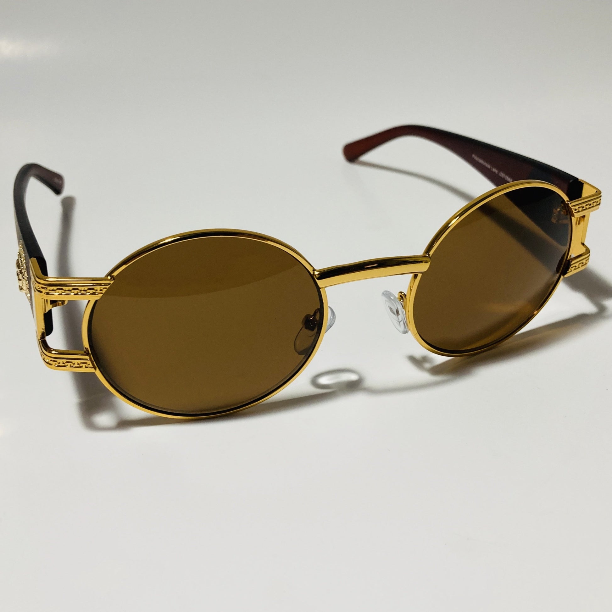 mens and womens brown and gold round sunglasses