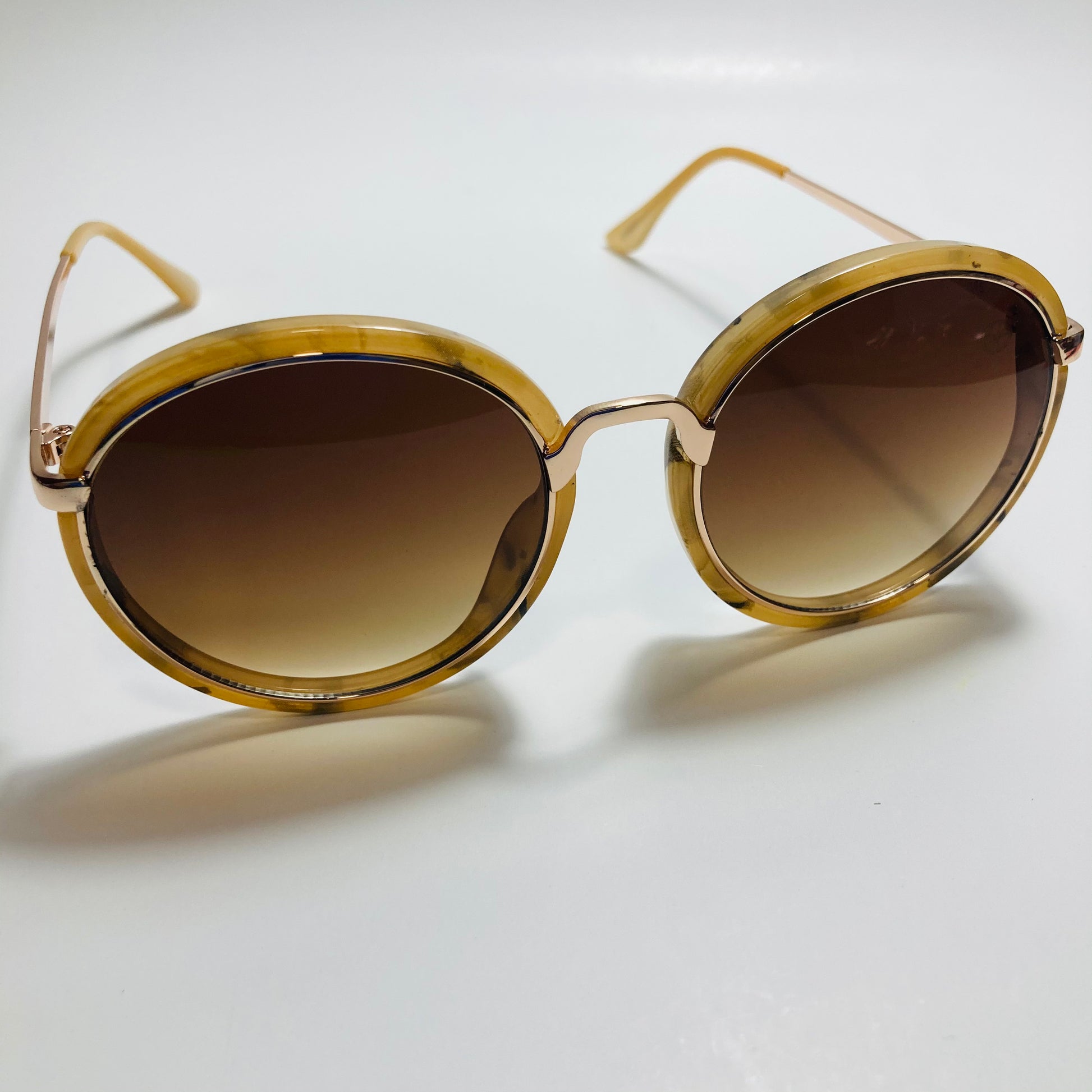 womens brown and gold mirrored round sunglasses
