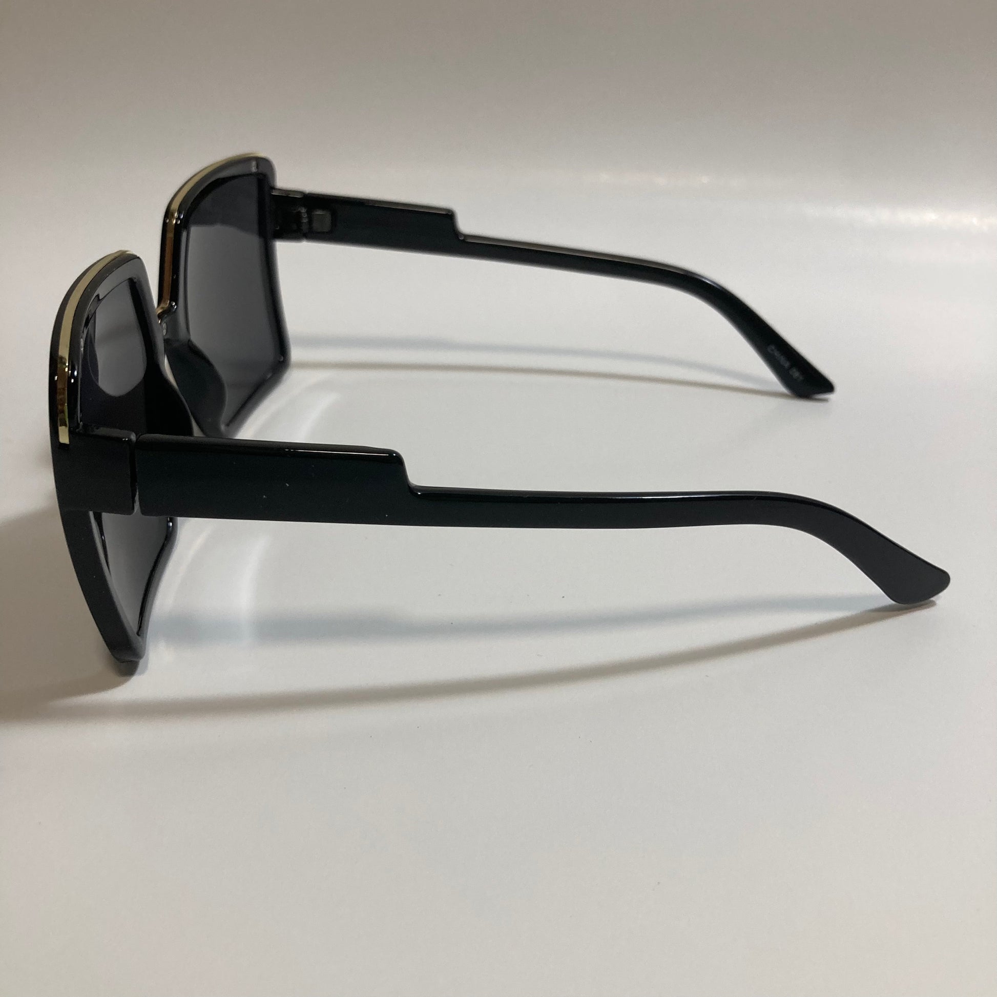 womens black square oversize sunglasses with gold accent