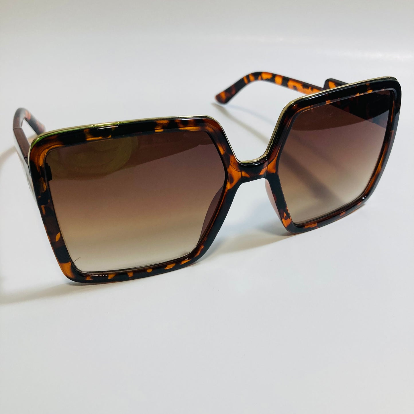 womens brown square oversize sunglasses with gold accent