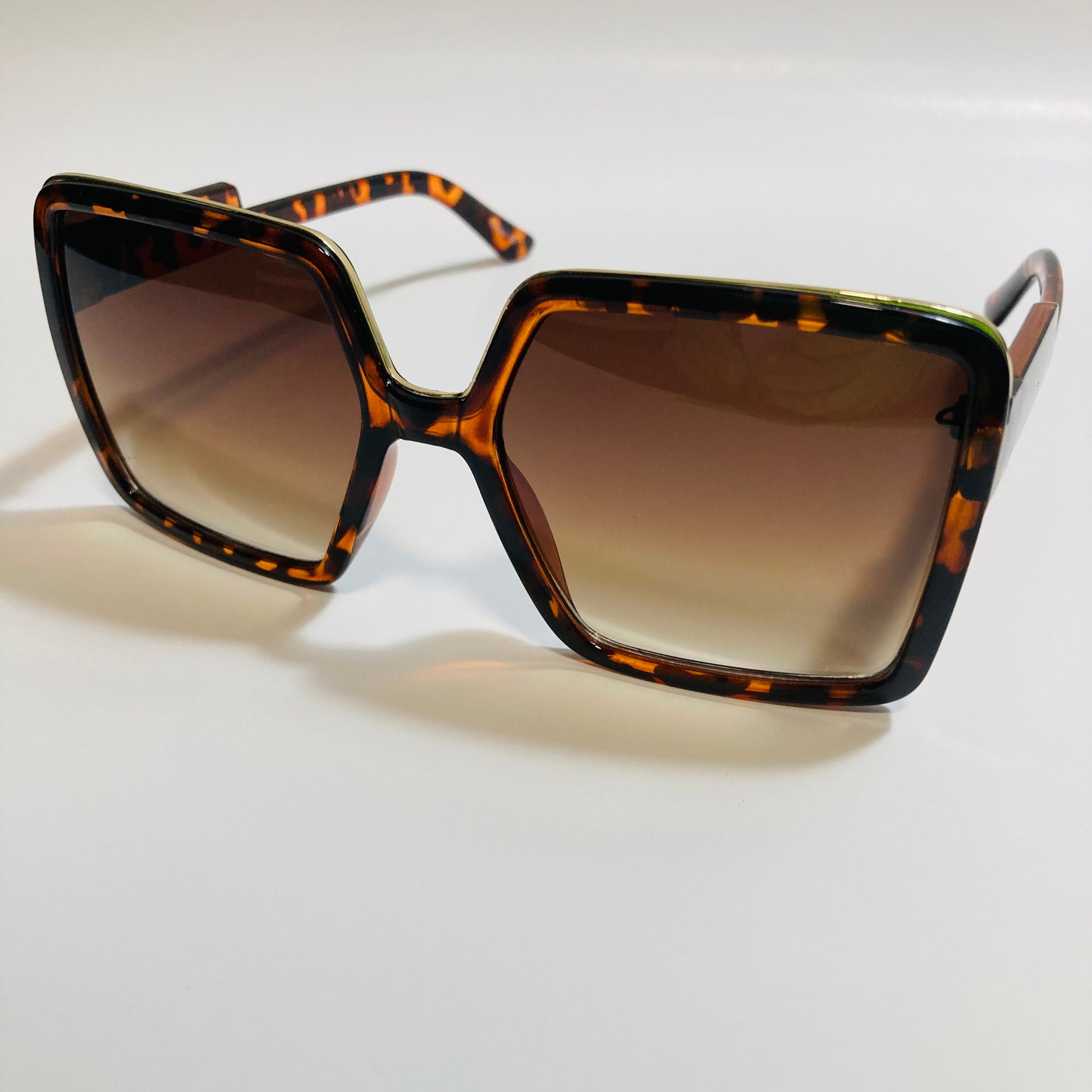 womens brown square oversize sunglasses with gold accent