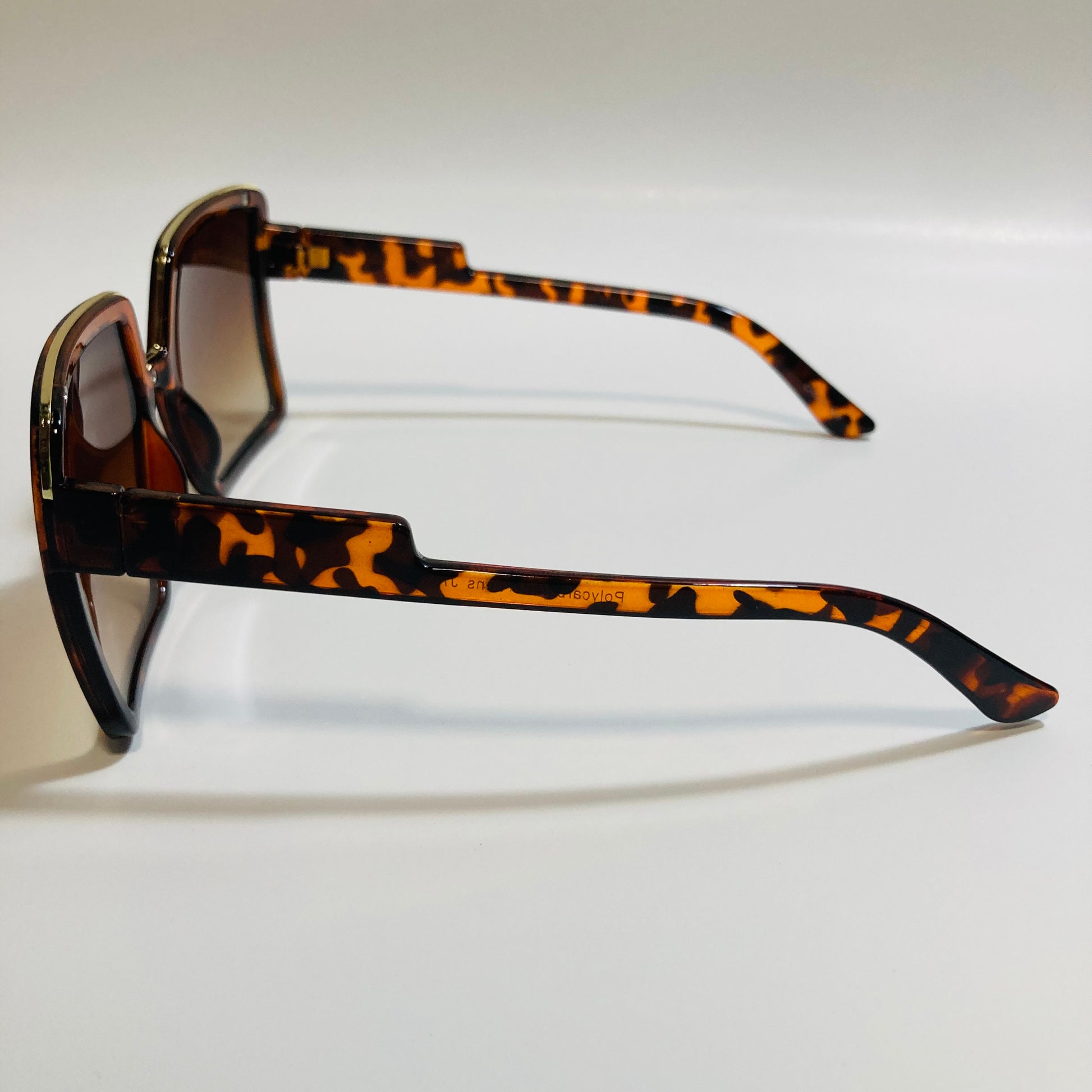 womens brown square oversize sunglasses with gold accent