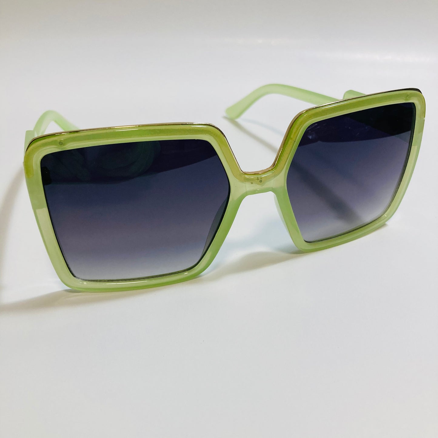 womens green and black square oversize sunglasses with gold accent