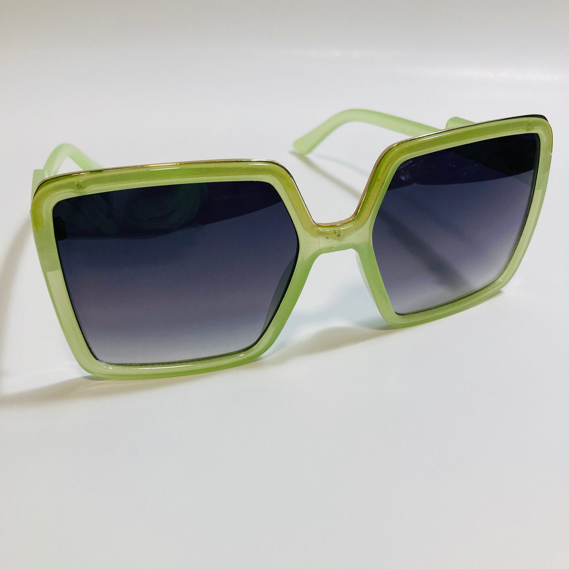 womens green and black square oversize sunglasses with gold accent