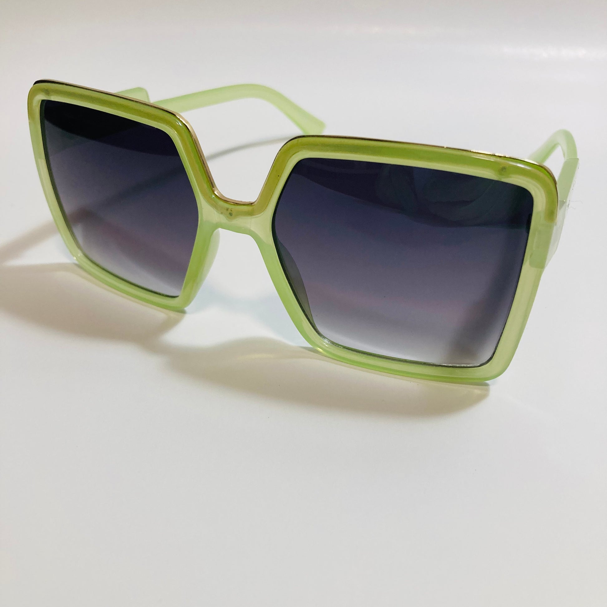 womens green and black square oversize sunglasses with gold accent