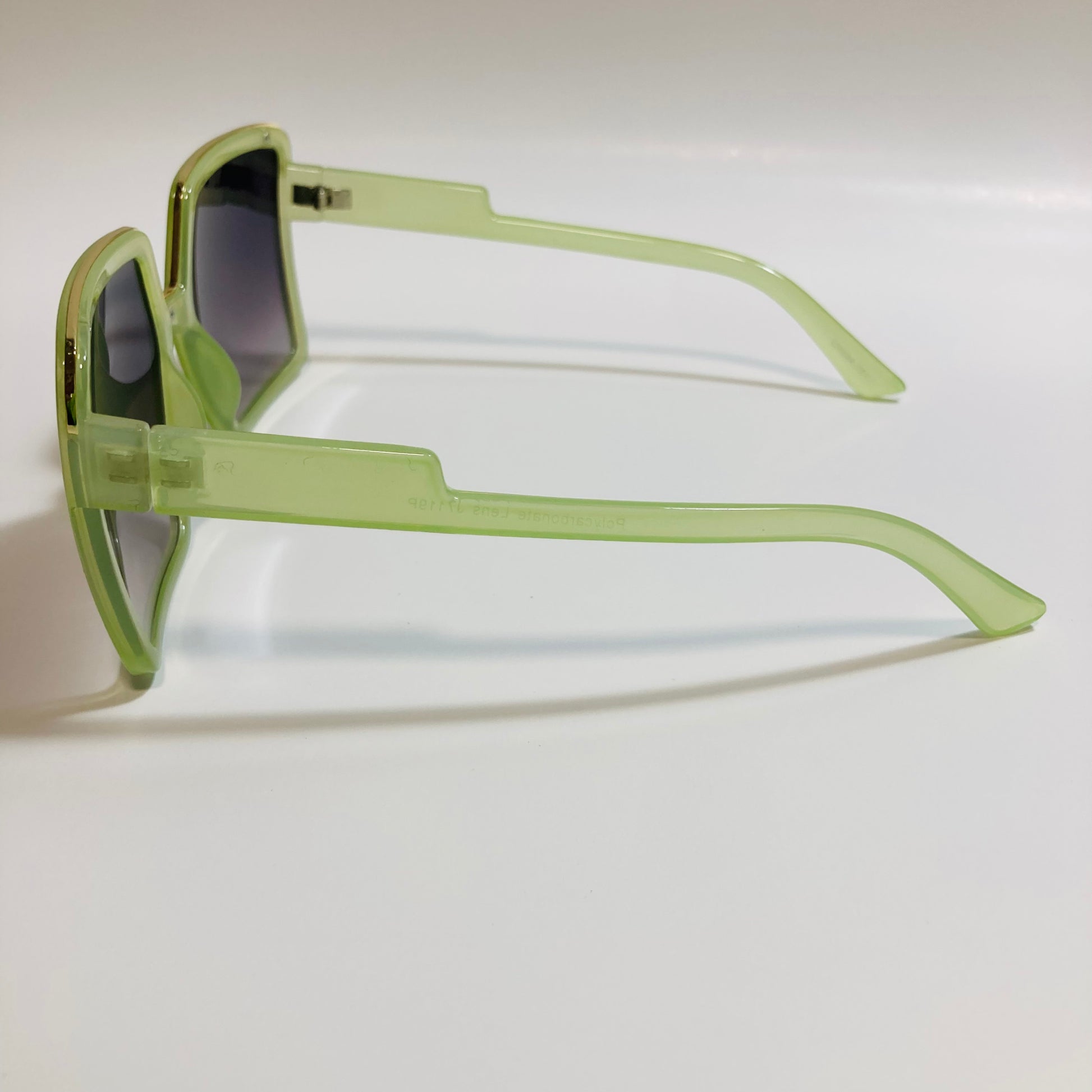 womens green and black square oversize sunglasses with gold accent