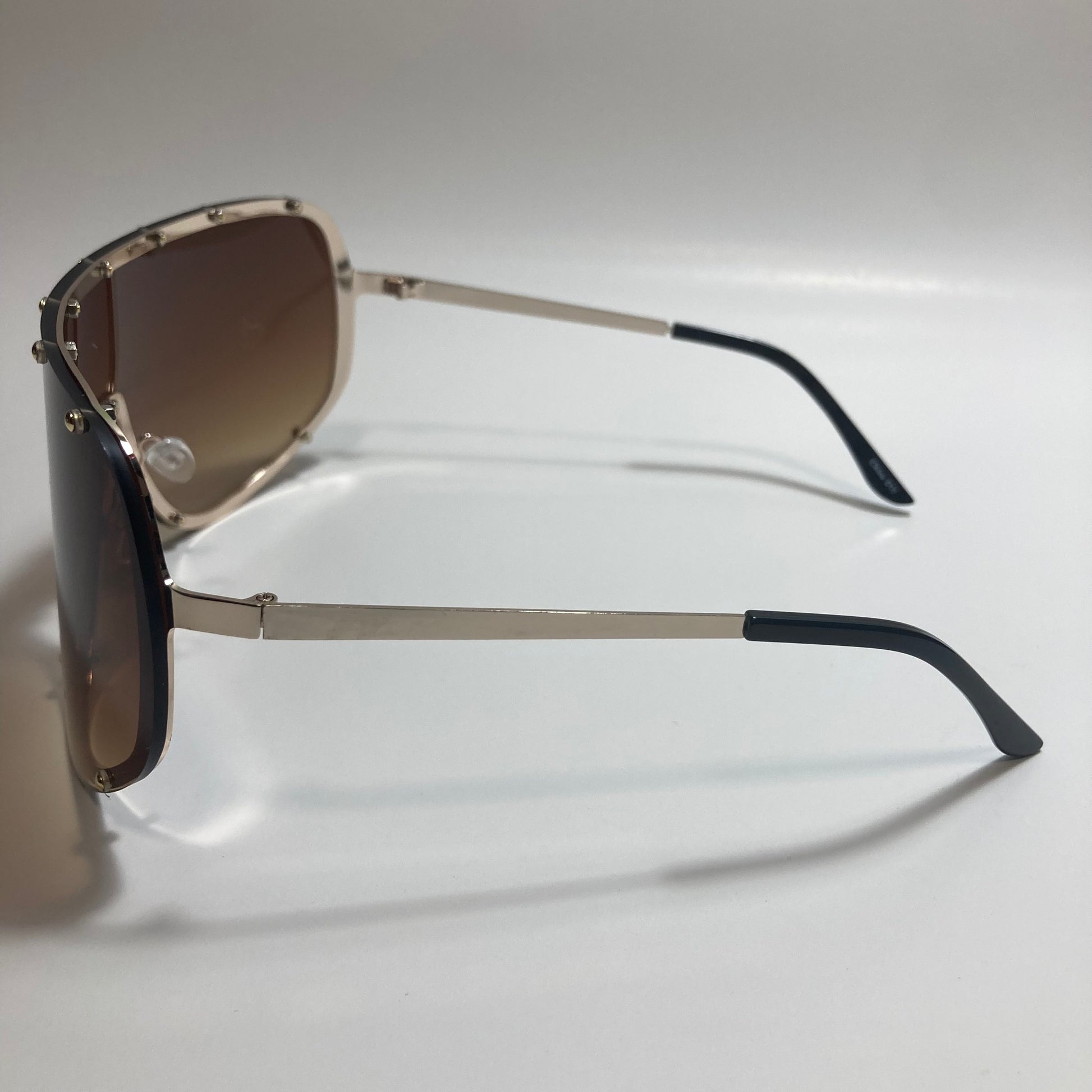 womens brown and gold oversize shield sunglasses