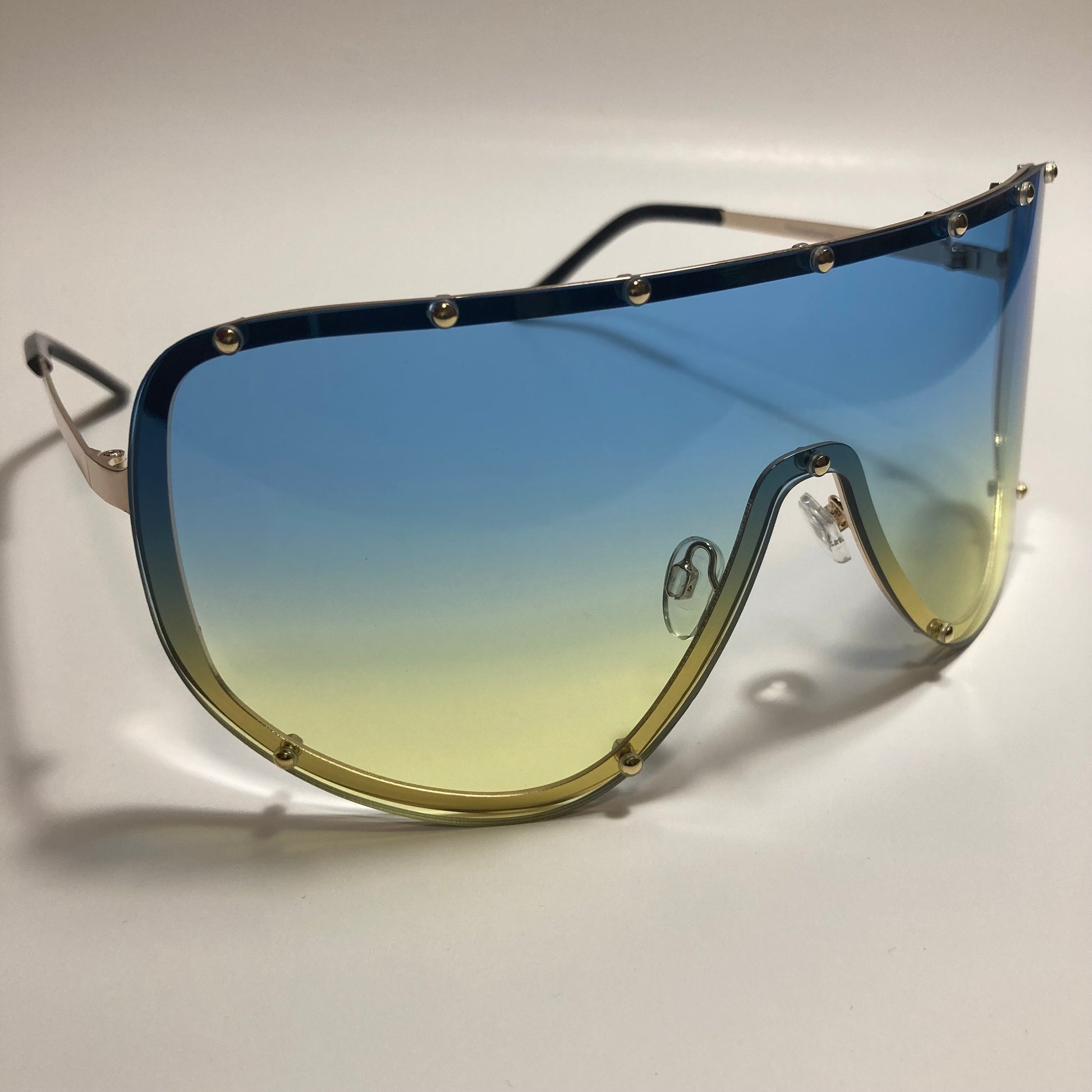 womens yellow blue and gold oversize shield sunglasses