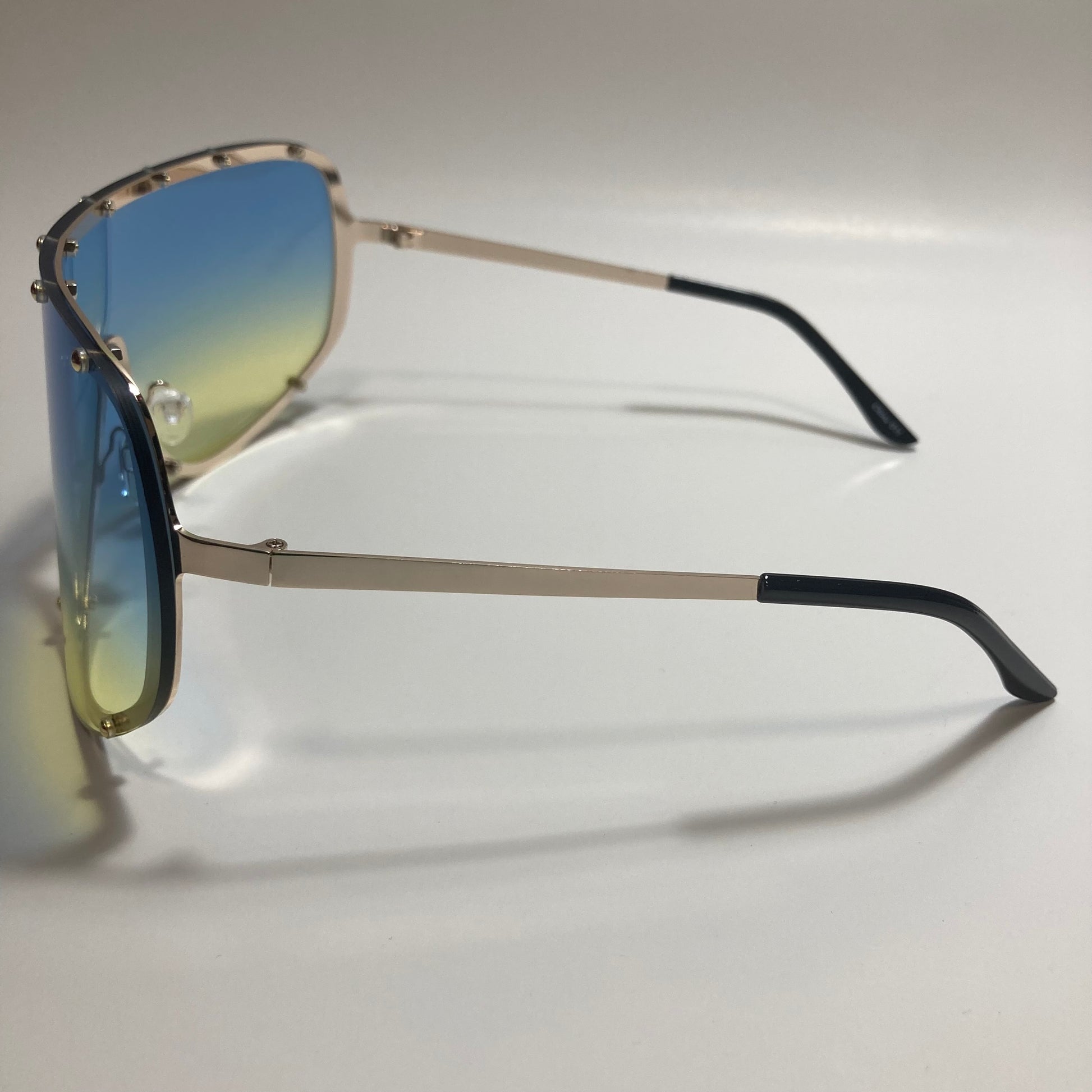 womens yellow blue and gold oversize shield sunglasses