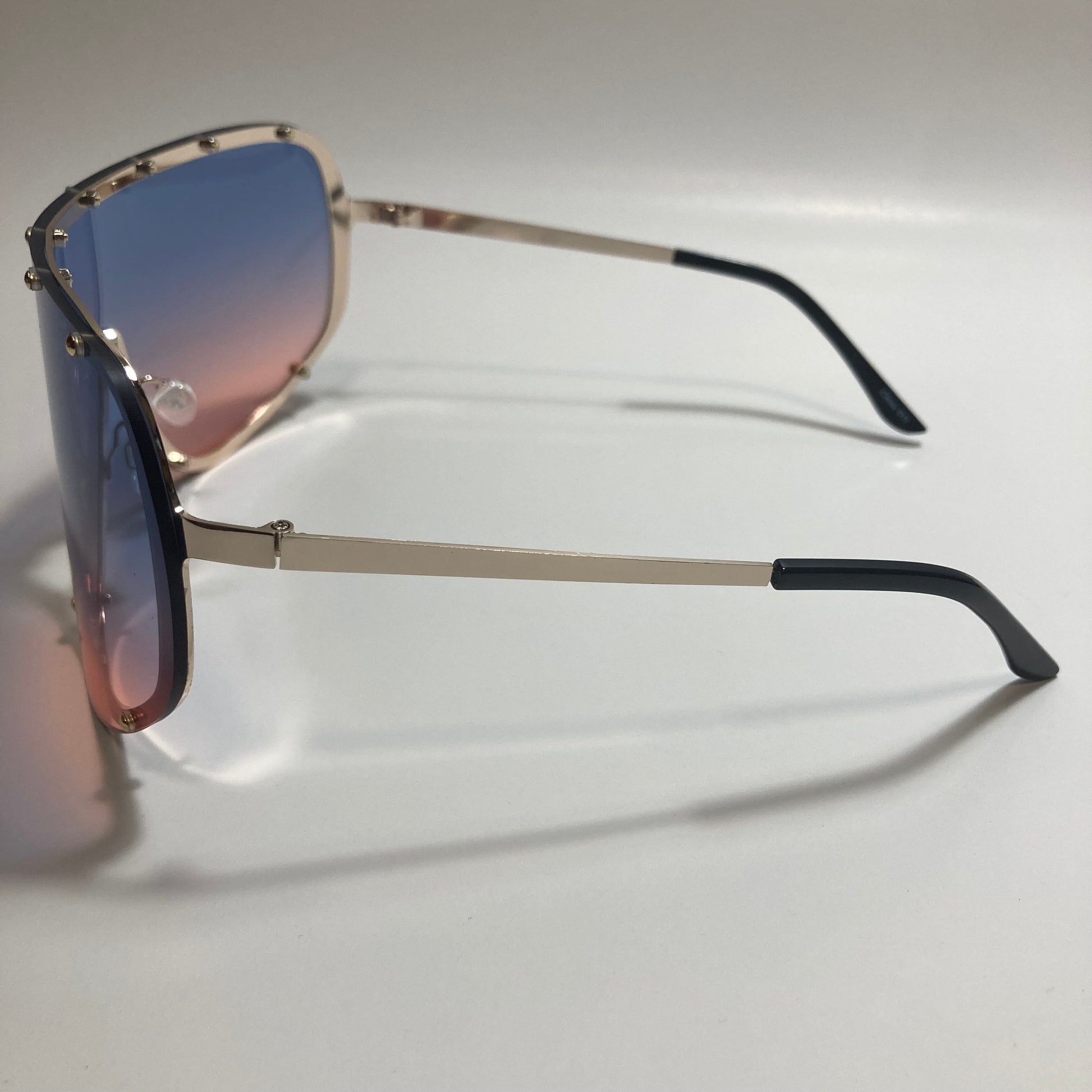 womens pink blue and gold oversize shield sunglasses