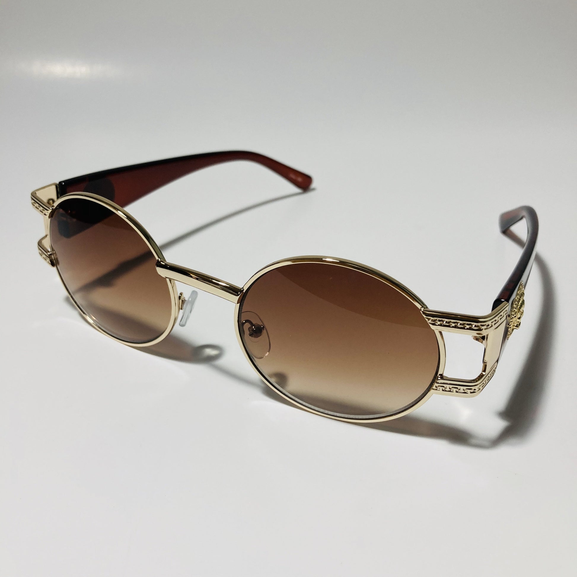 mens and womens brown and gold round sunglasses
